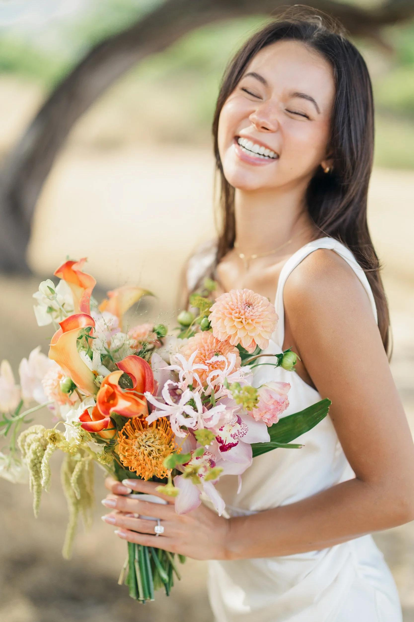 Natural light bridal portrait from Oahu beach elopement