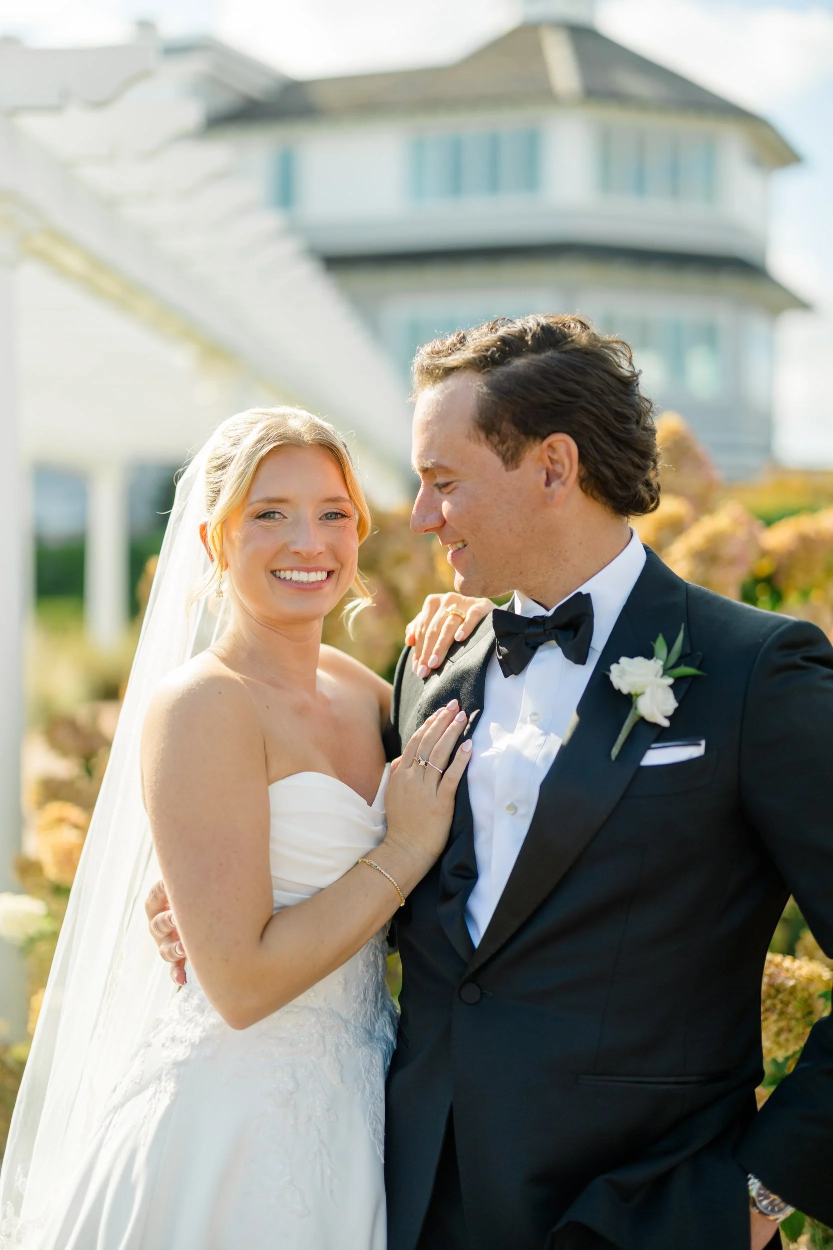 Bride and groom photographed at Wychmere Beach Club's Dune wedding venue.