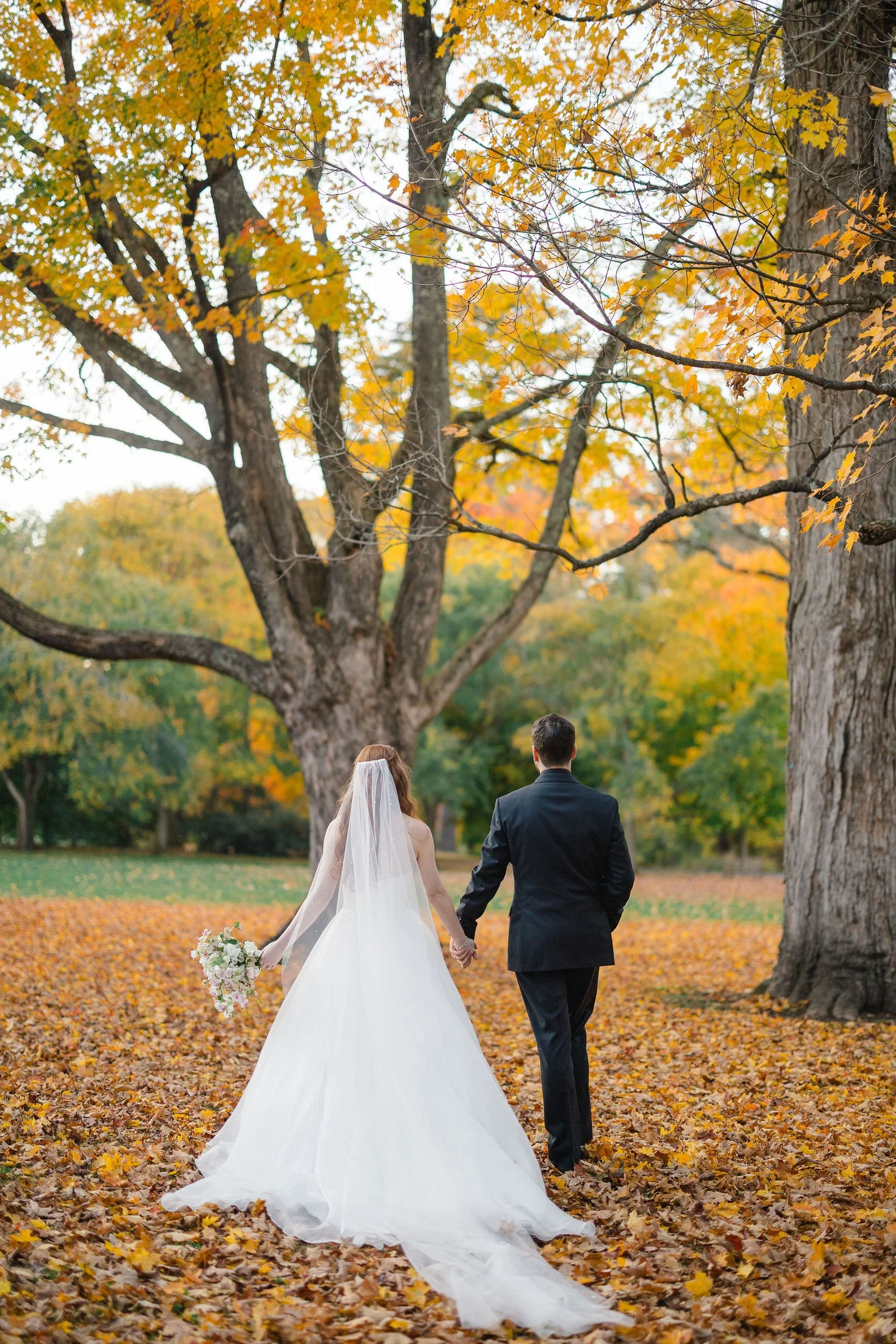 Wedding couple photographed during sunset at Elm Bank in Wellesley, Massachusetts.