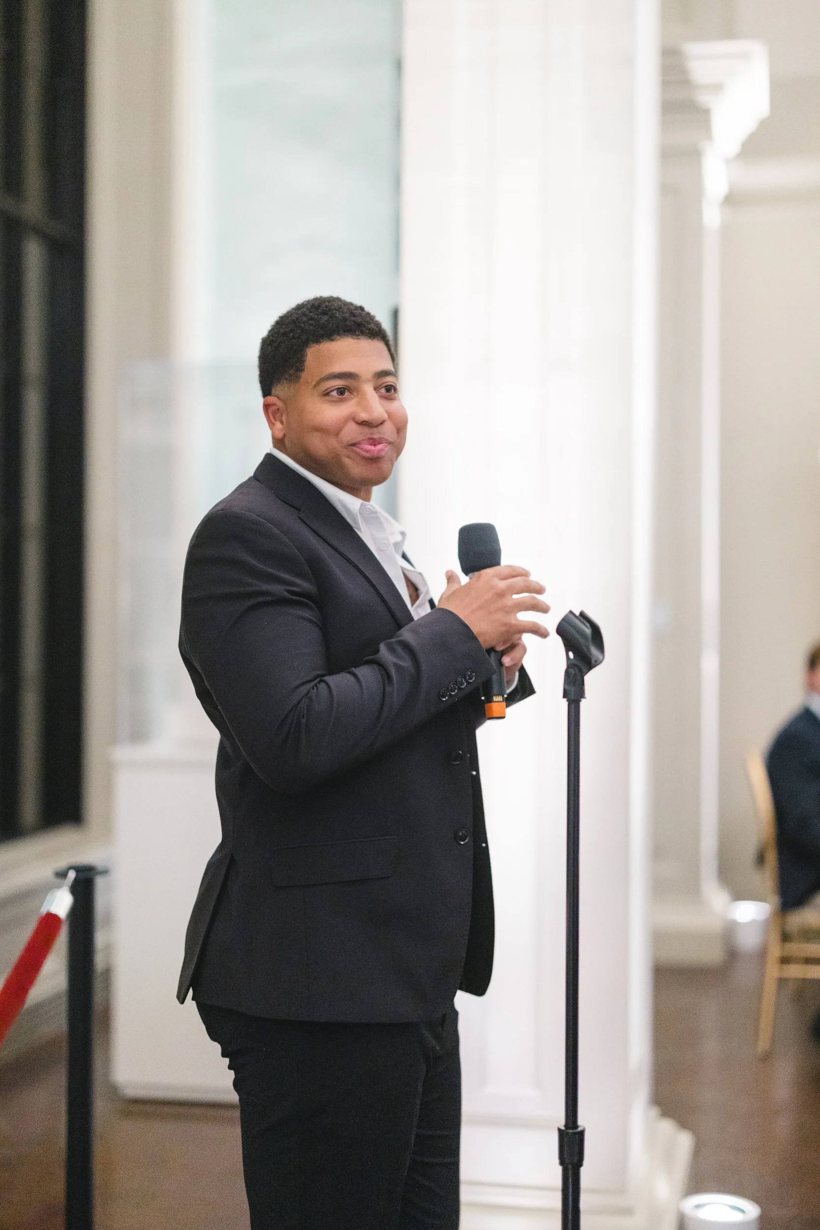 Emotional speech during a candlelit rehearsal dinner at the Boston Athenaeum