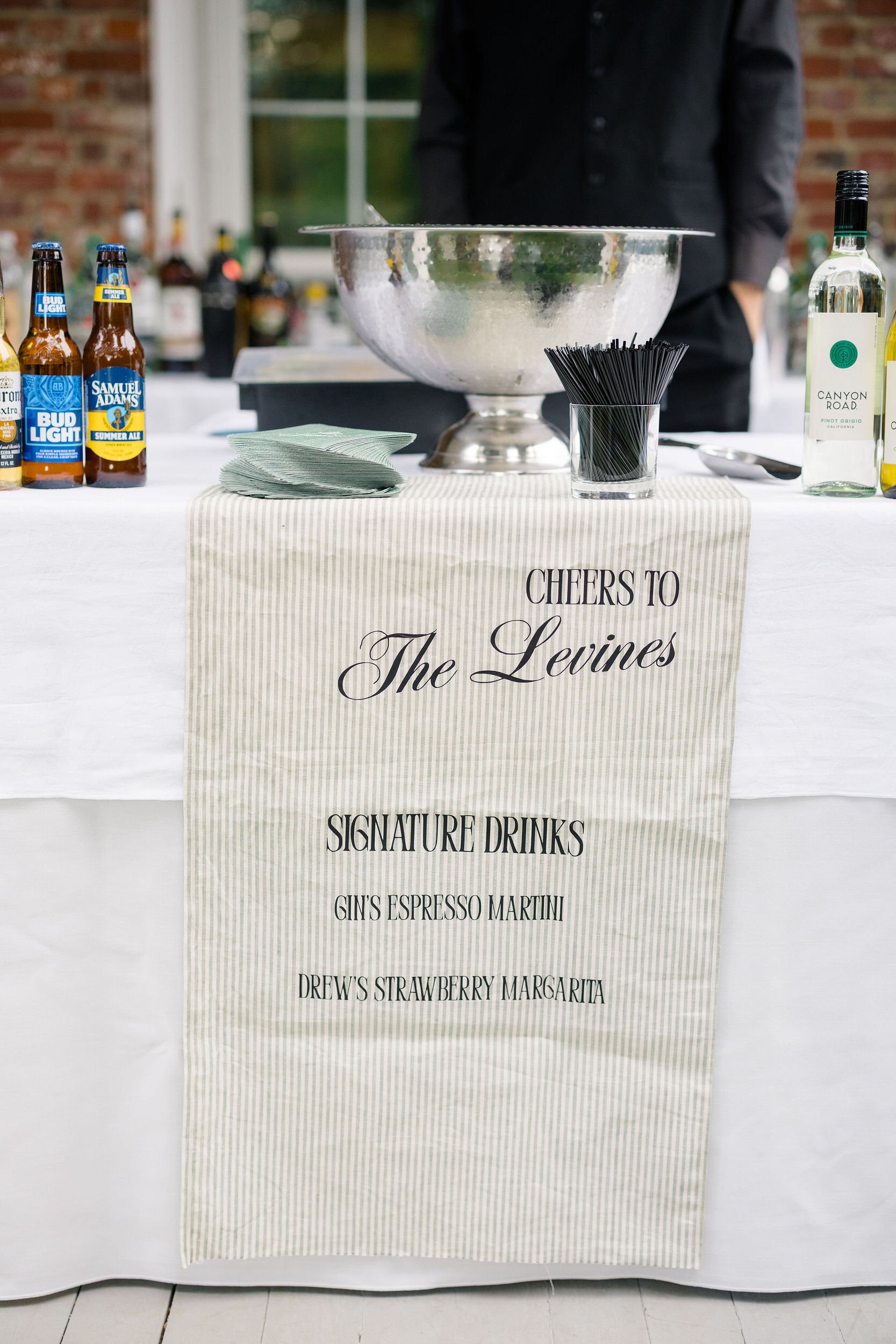 Outdoor wedding cocktail hour among the gardens at Long Hill estate.