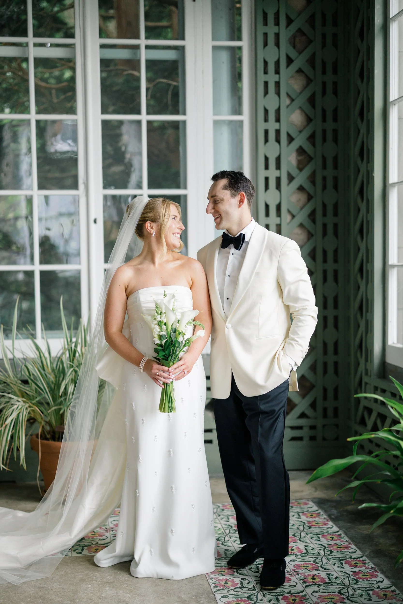 Editorial wedding portraits inside historic Blithewold Mansion.
