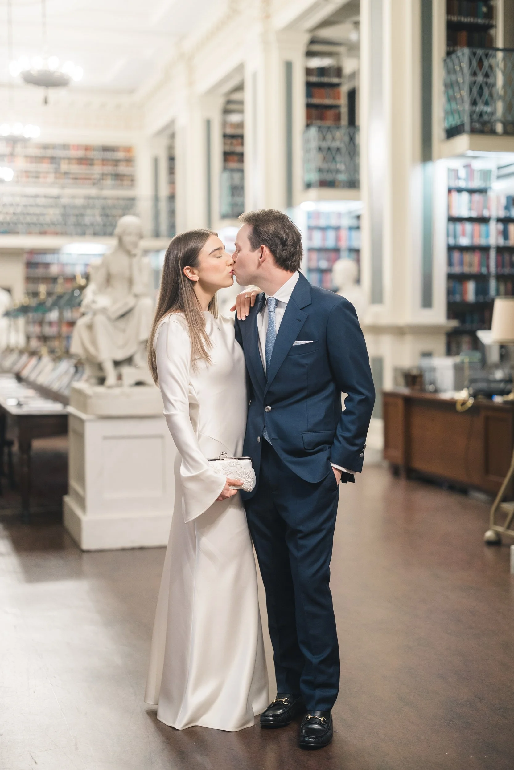 Editorial-style couple portrait in the reading room at the Boston Athenaeum