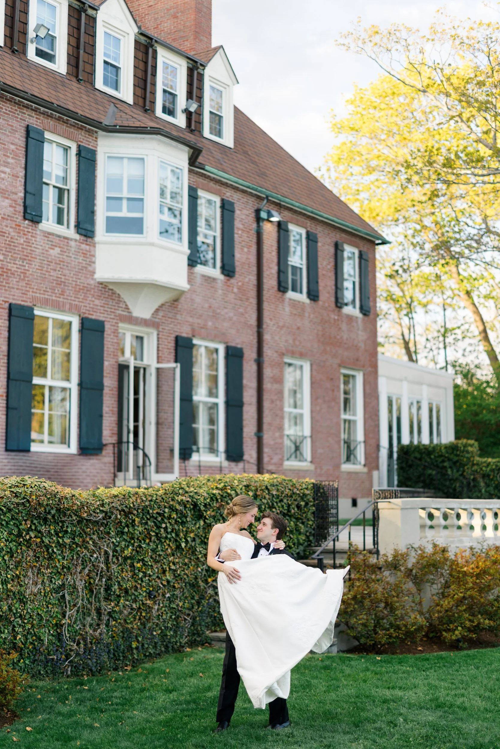 Bride and groom portraits during golden hour at oceanfront Massachusetts wedding