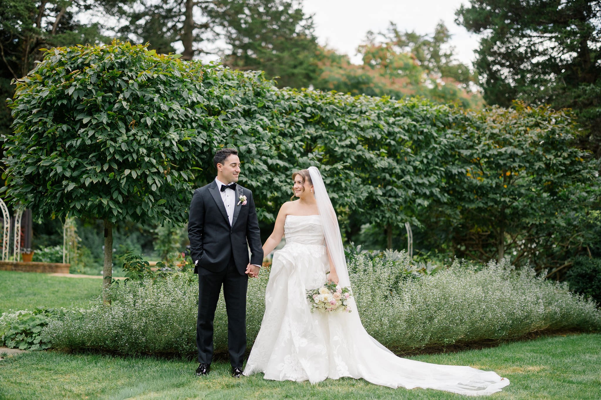 Timeless wedding portraits photographed in the gardens of a Massachusetts estate.