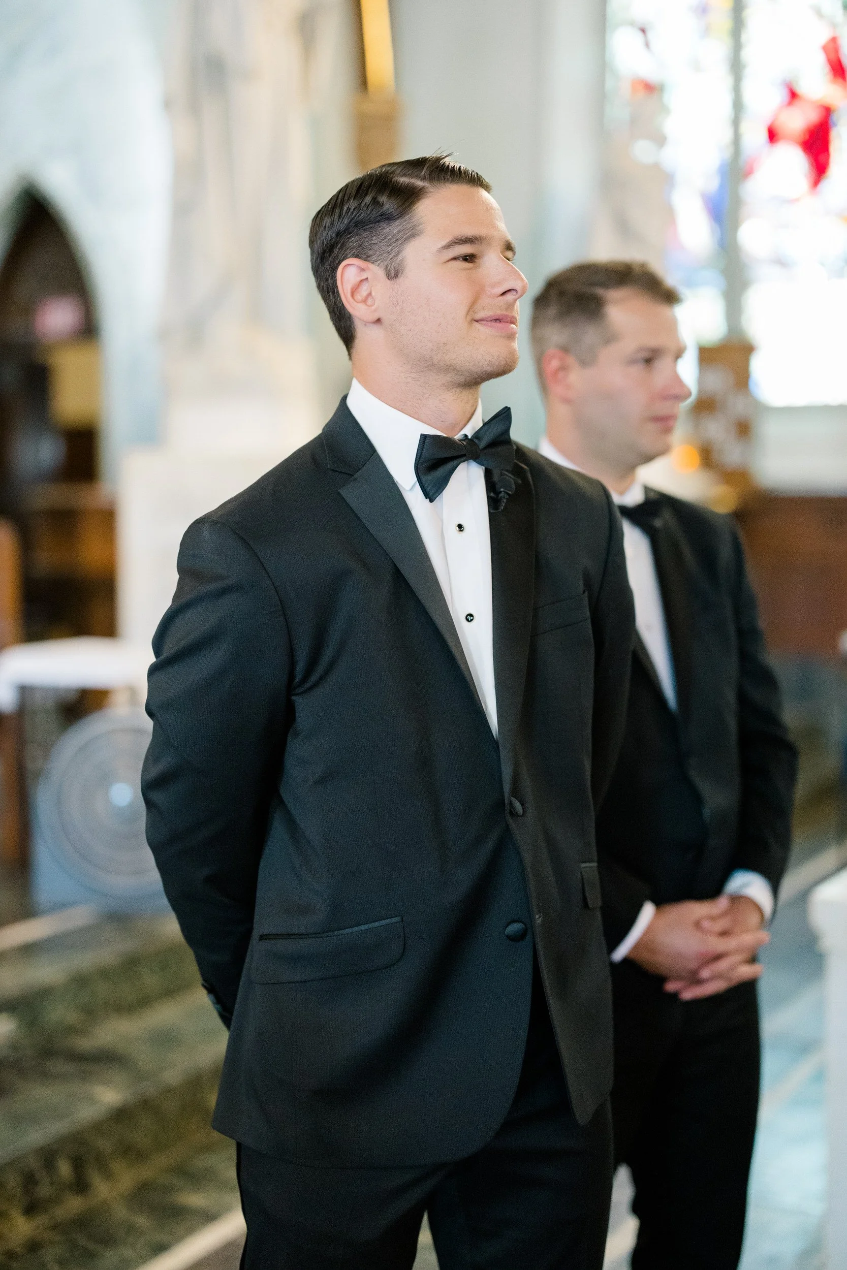 Wedding ceremony inside St. Lawrence Martyr Parish before the Cape Cod private estate reception.