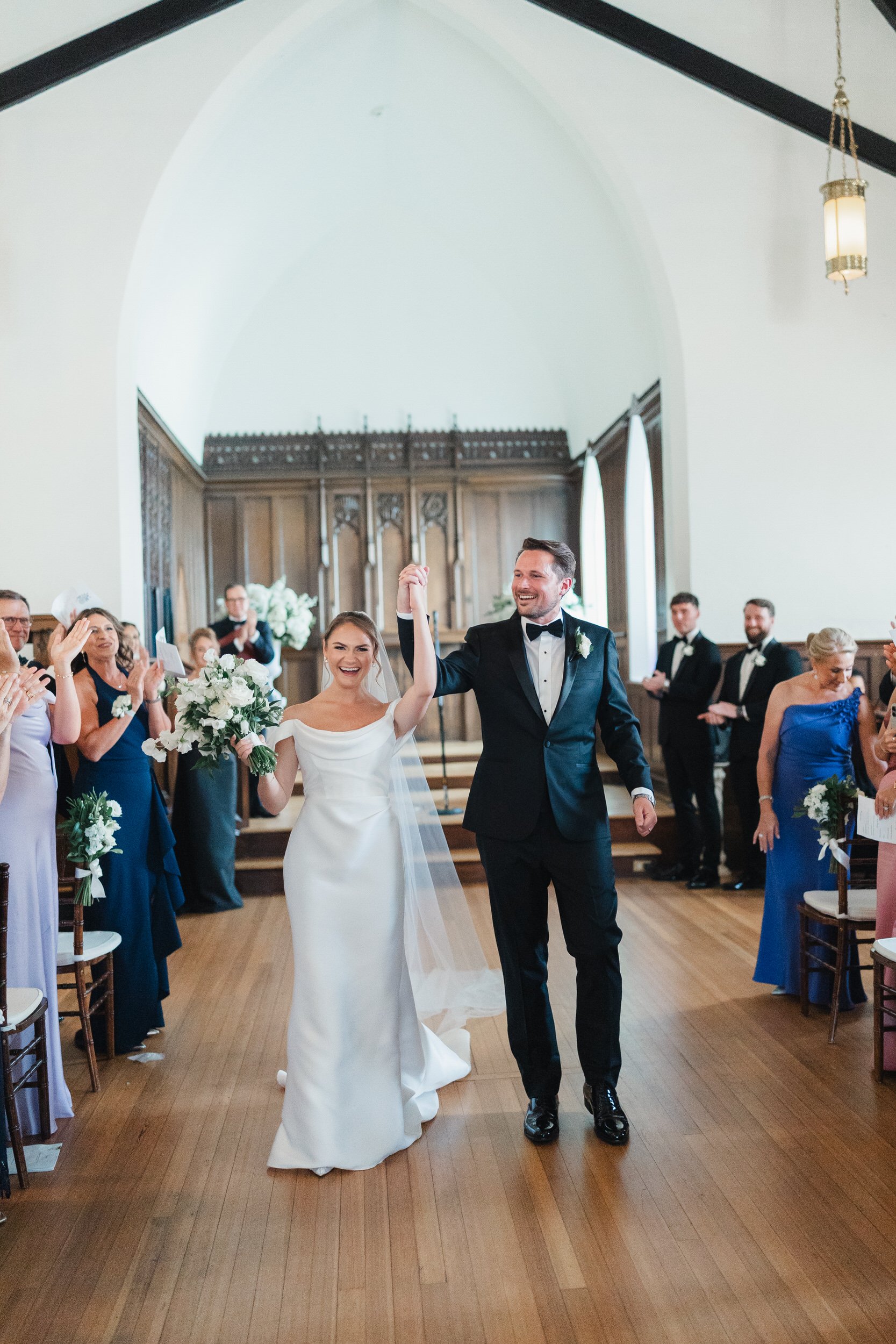 Documentary wedding ceremony coverage by a Rosecliff wedding photographer