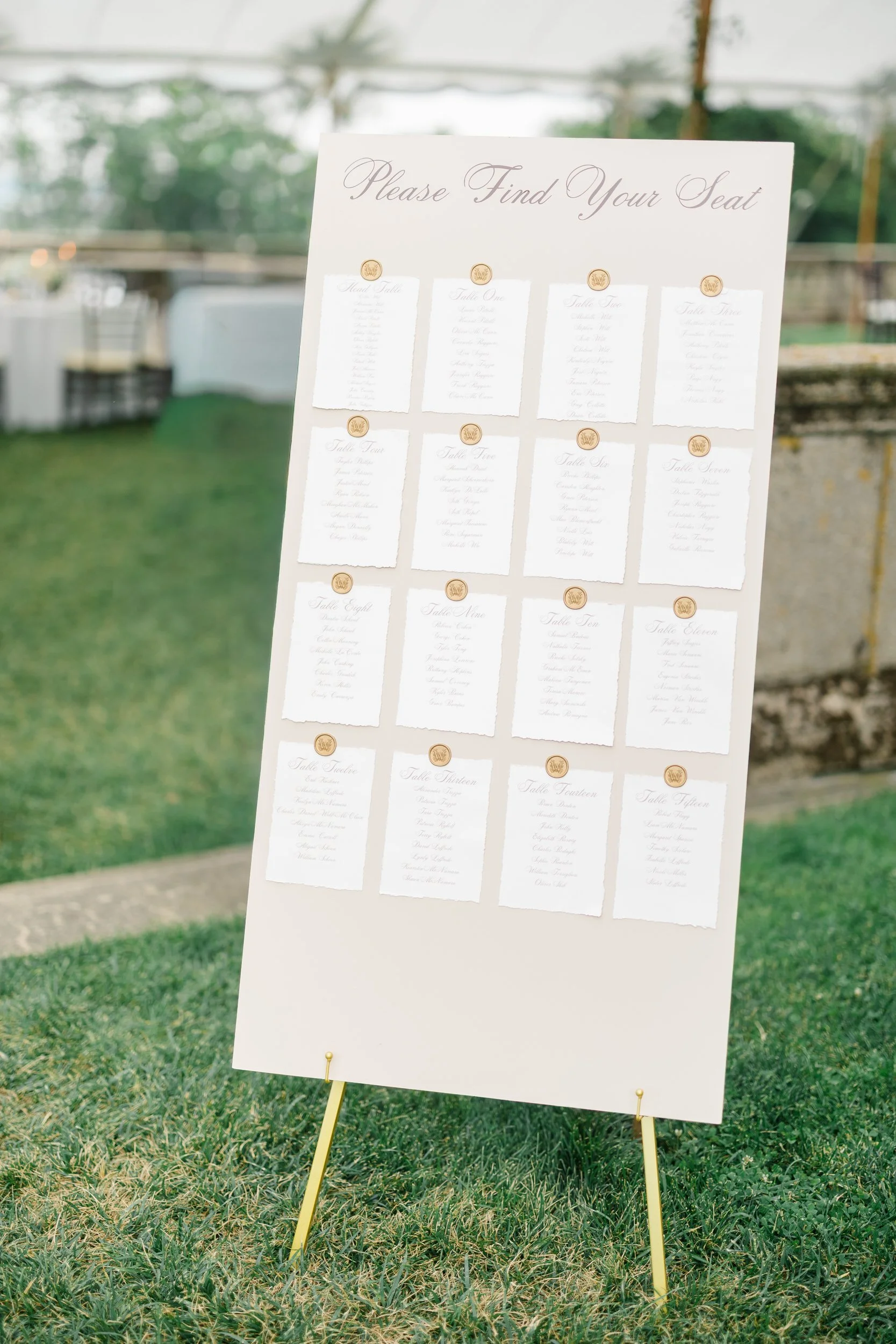 Elegant seating chart for a Castle Hill on the Crane Estate reception.