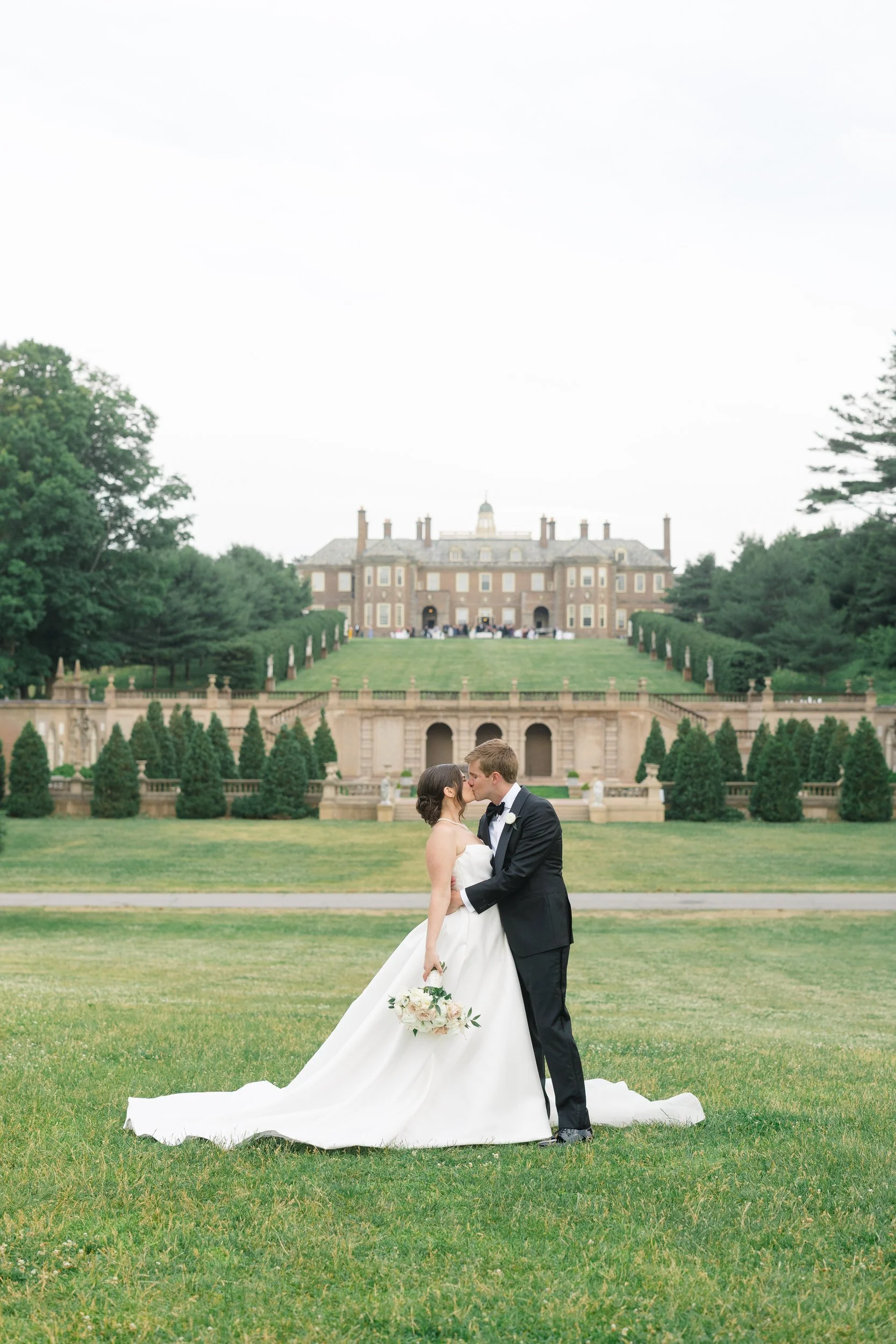 Golden hour couple’s portraits overlooking the historic Crane Estate landscape in Ipswich, Massachusetts.