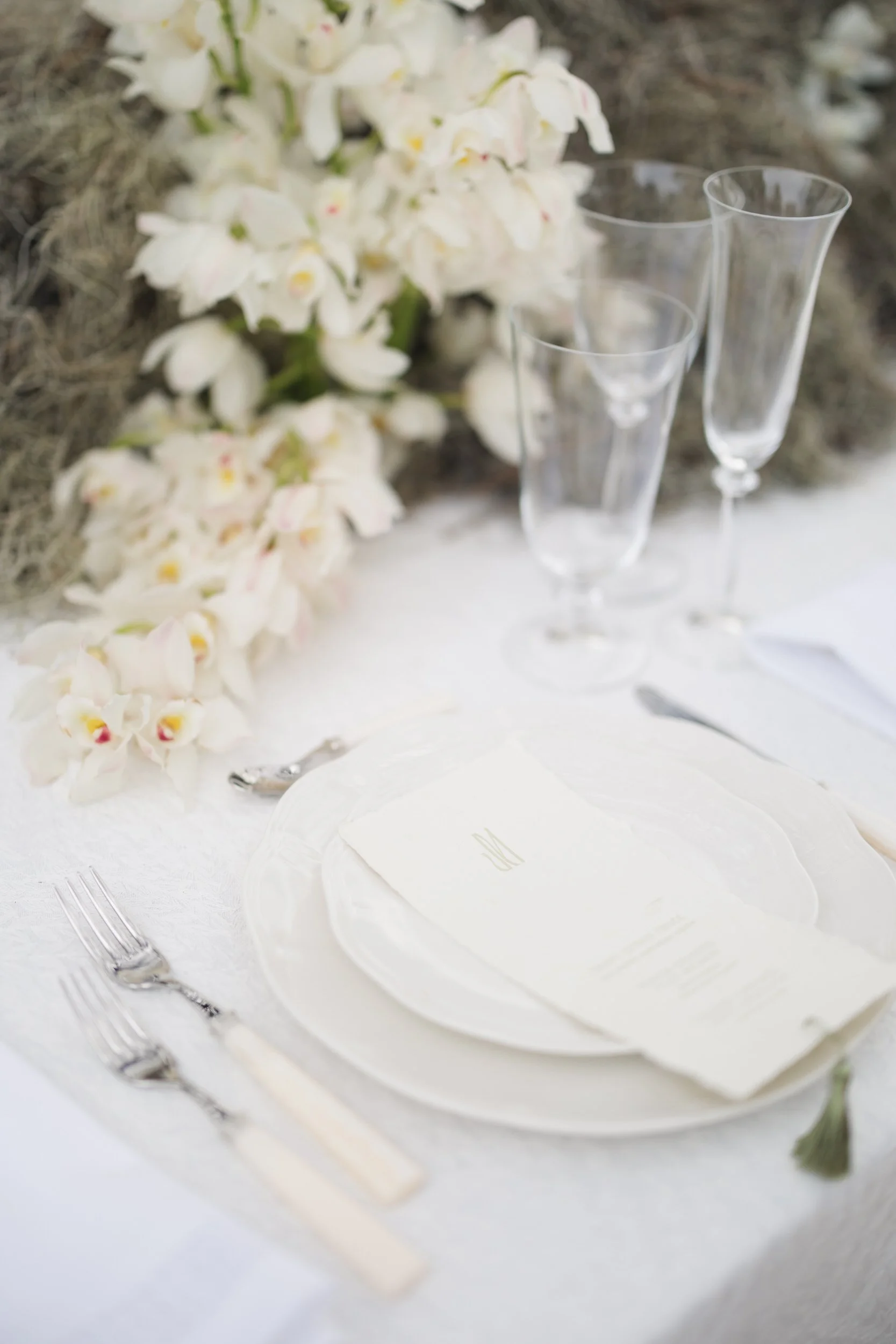 Elegant Lowndes Grove wedding reception setup with floral centerpieces