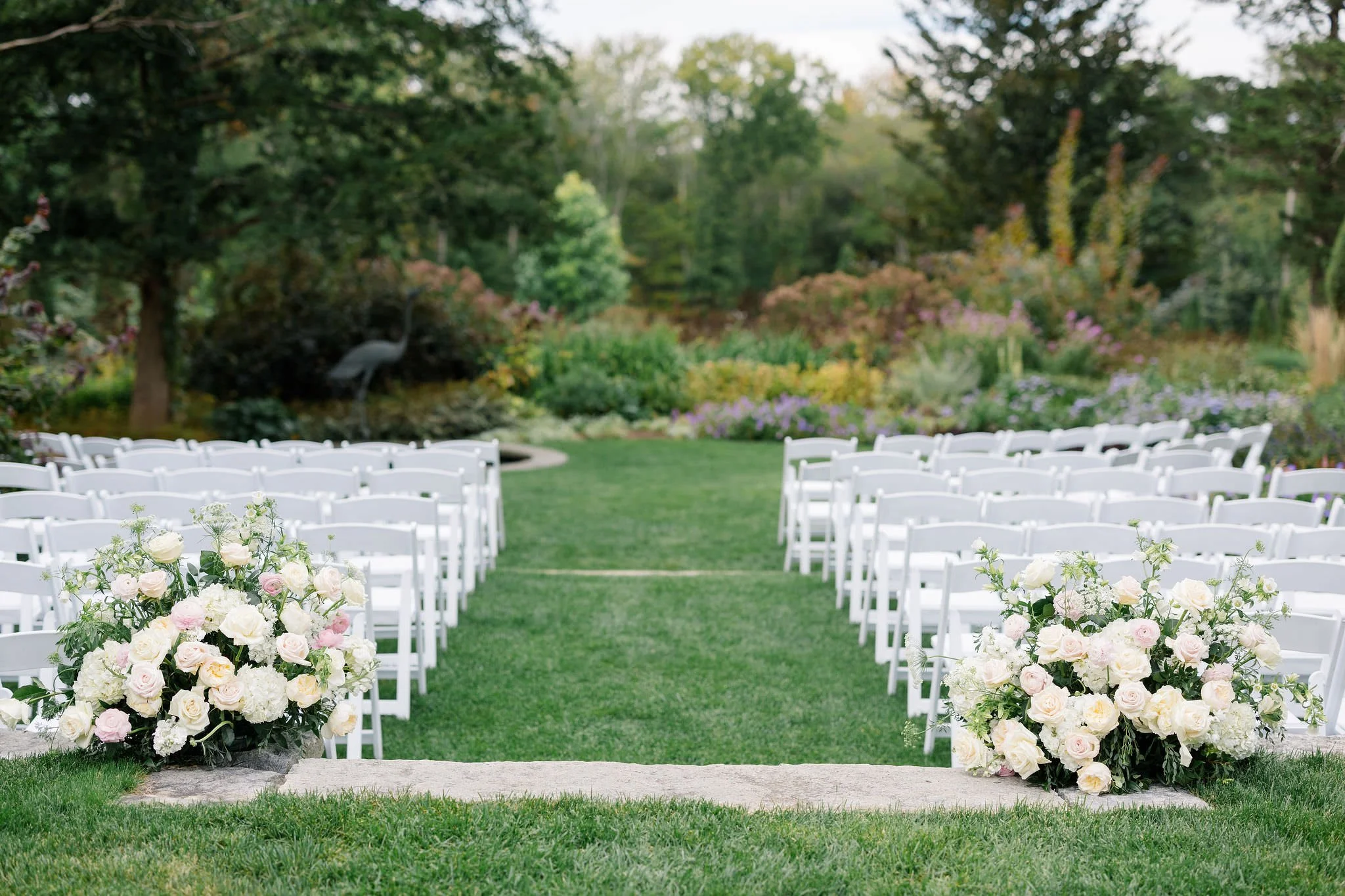 Floral arrangements and ceremony details for a Long Hill wedding.