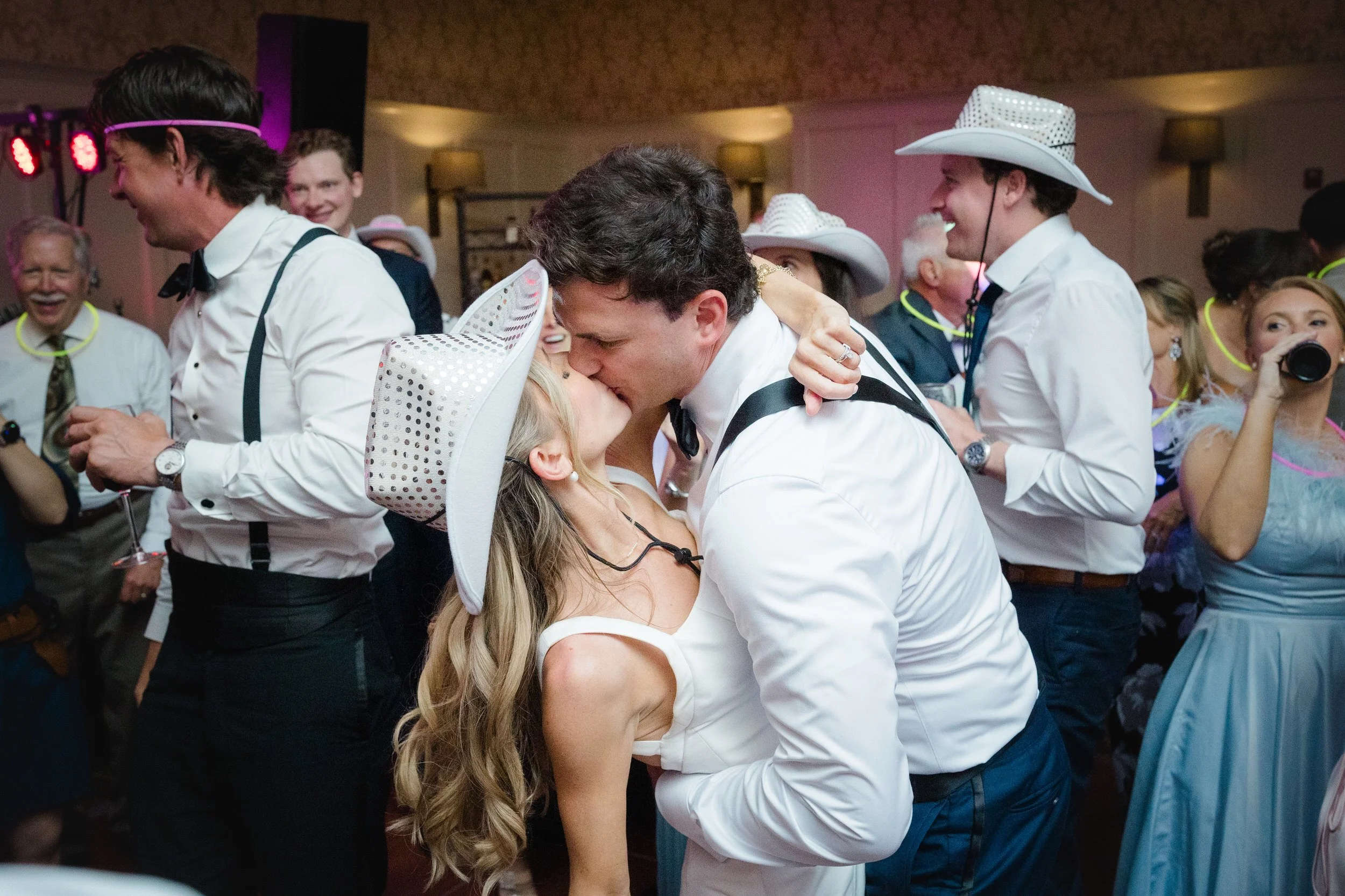 Wedding guests celebrating on the dance floor