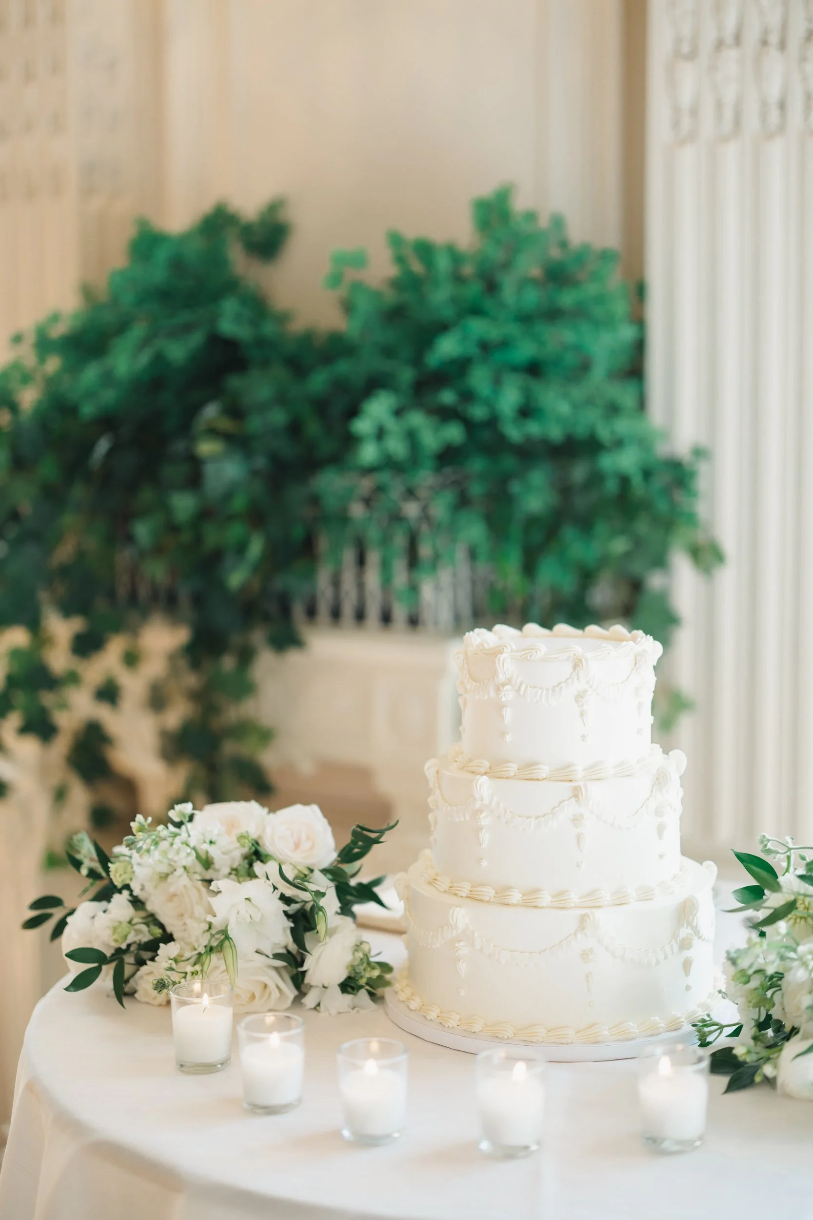 Wedding cake cutting captured by a Newport wedding photographer