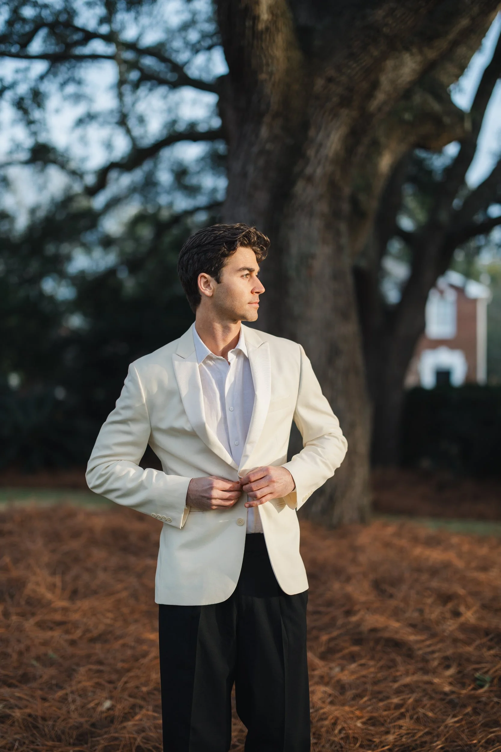 Romantic sunset wedding portraits of bride and groom at Lowndes Grove