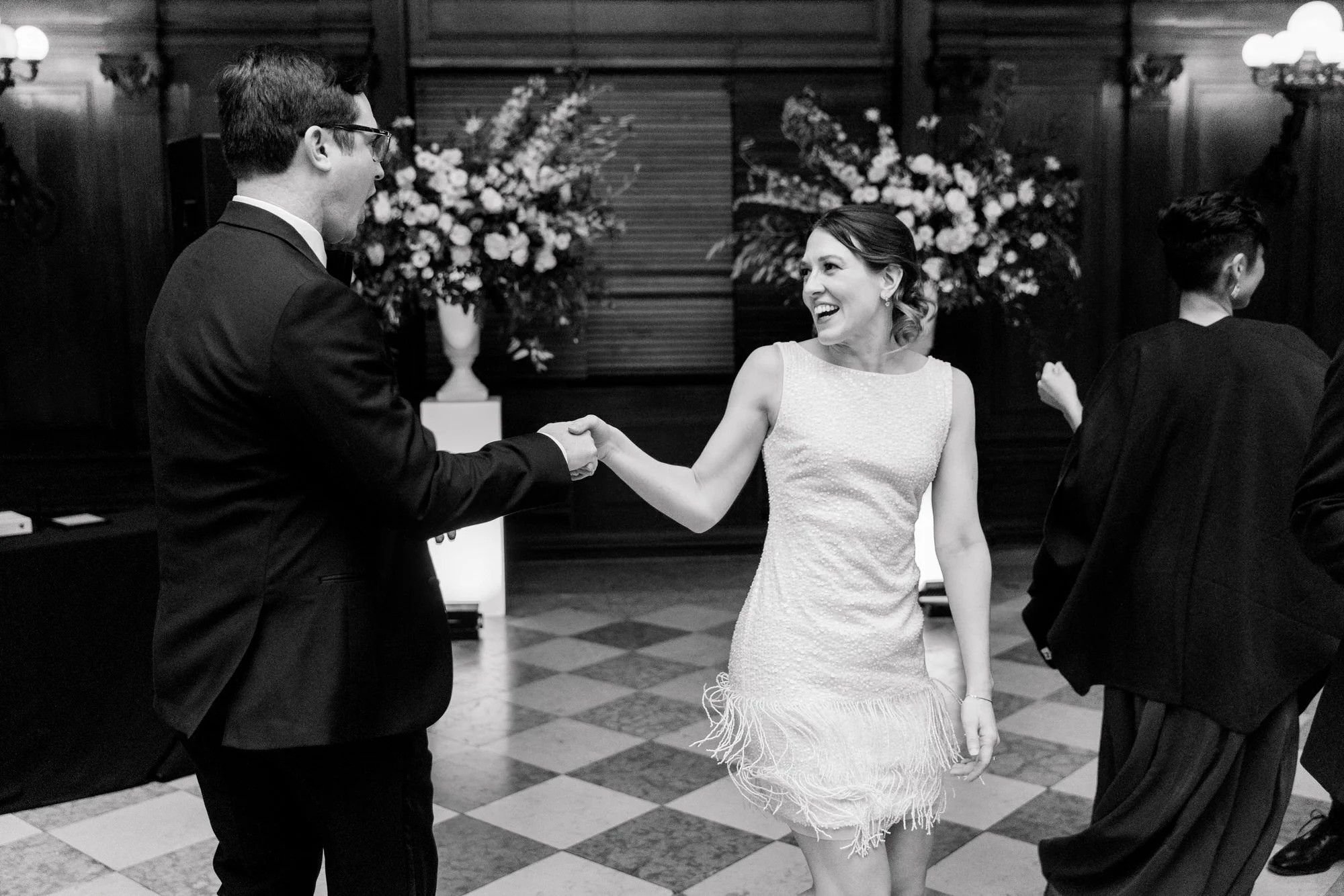Couple dance together at Boston Public Library Wedding