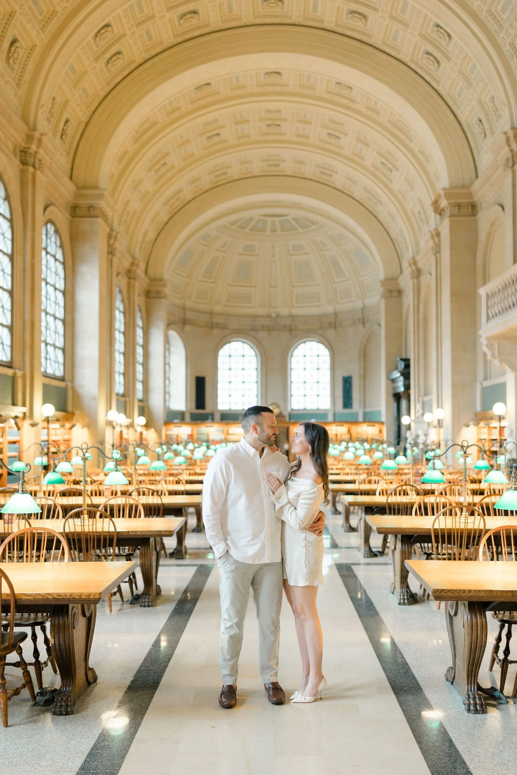 Elegant engagement portraits at the Boston Public Library featuring historic architecture
