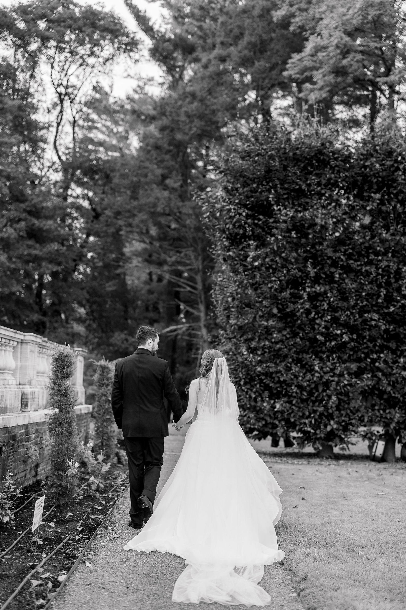Fall wedding ceremony with a romantic secret garden inspired aesthetic.