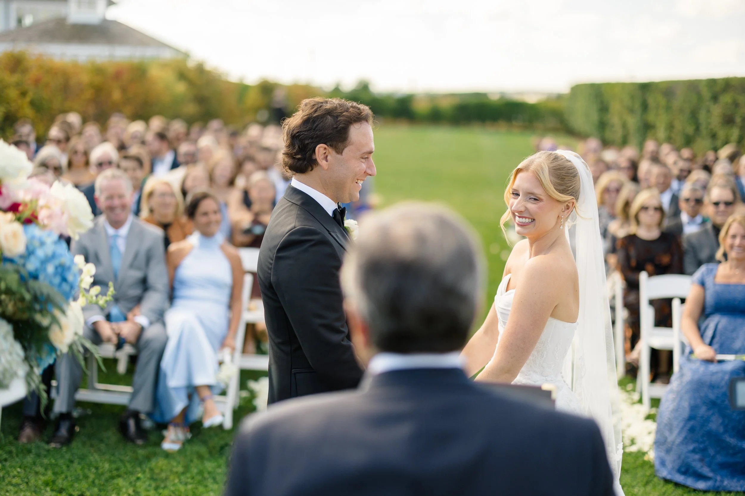 Emotional wedding ceremony moments at Wychmere Beach Club on Cape Cod.