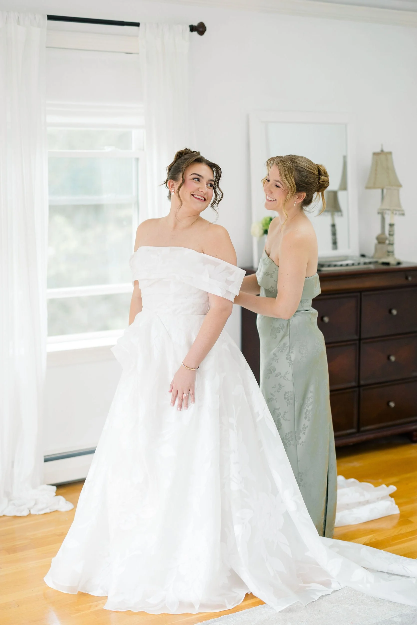 Bridal preparations photographed at the Long Hill wedding venue.