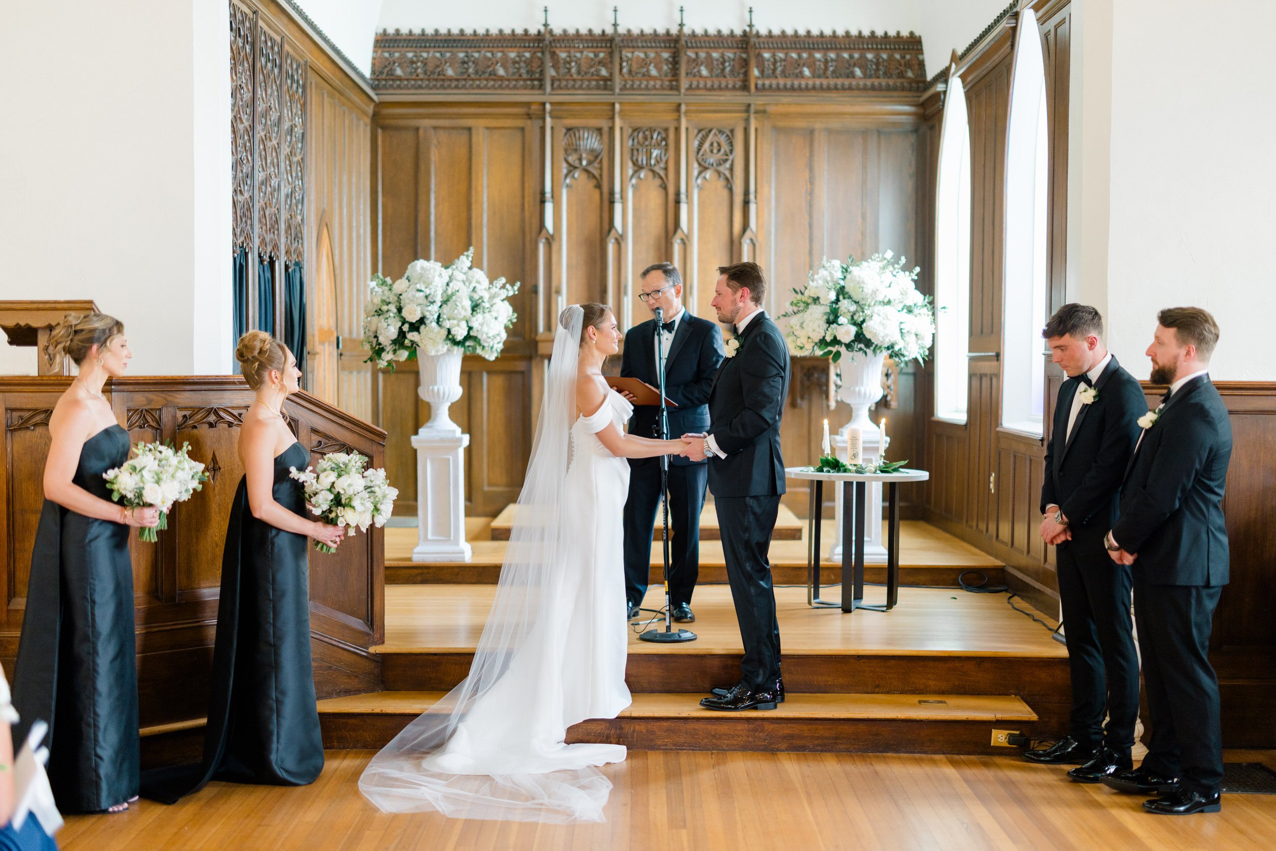 Couple exchanging vows at a Newport wedding ceremony