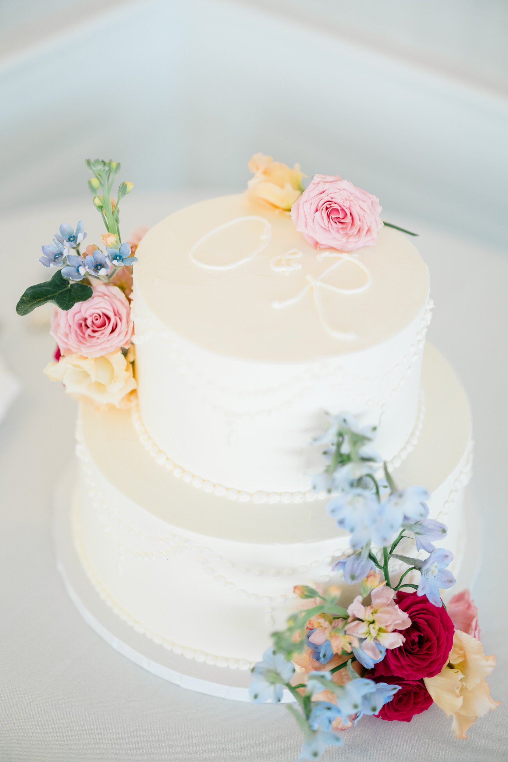 Wedding cake photographed inside the Ocean Room at Wychmere Beach Club.