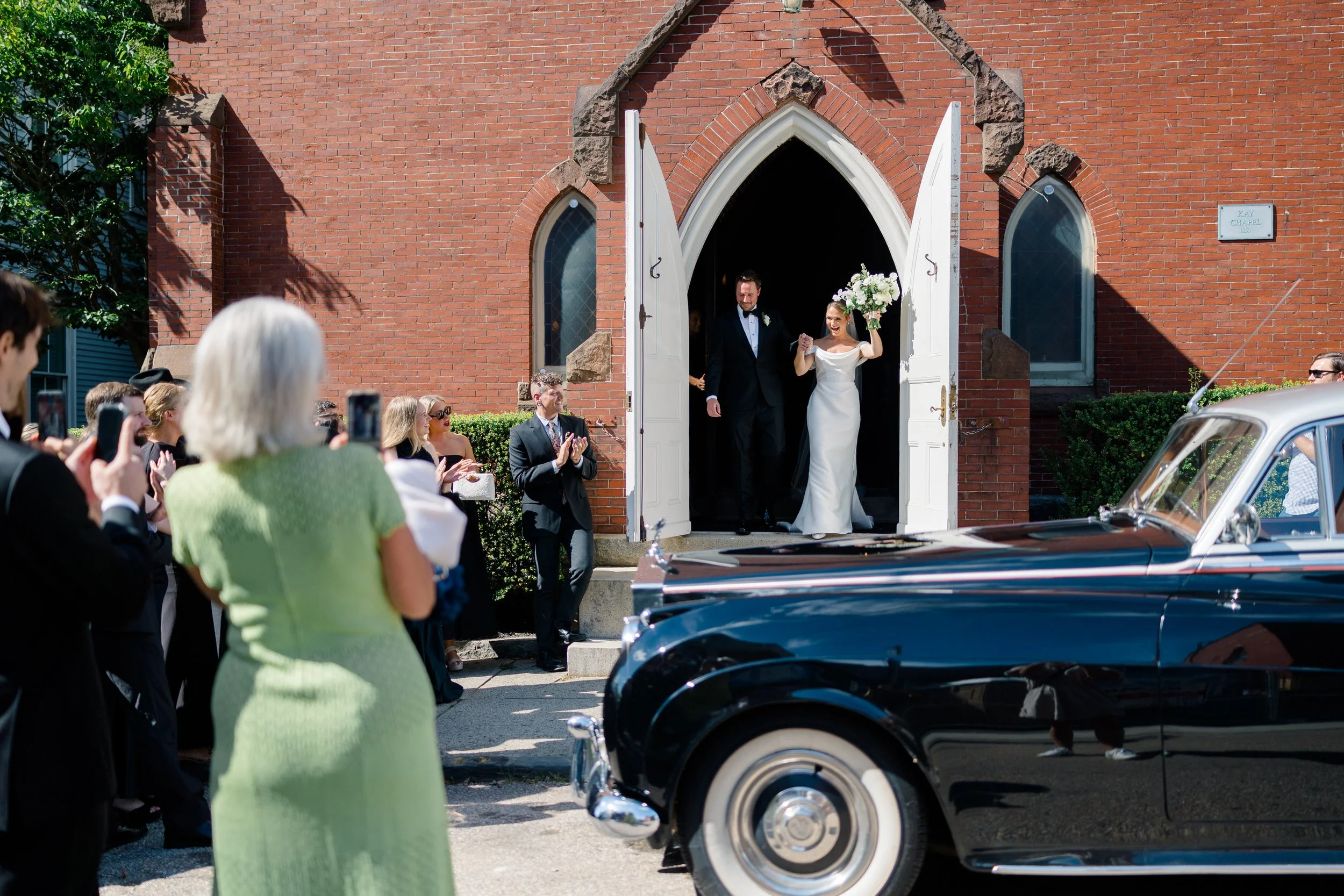 Documentary wedding ceremony coverage by a Rosecliff wedding photographer