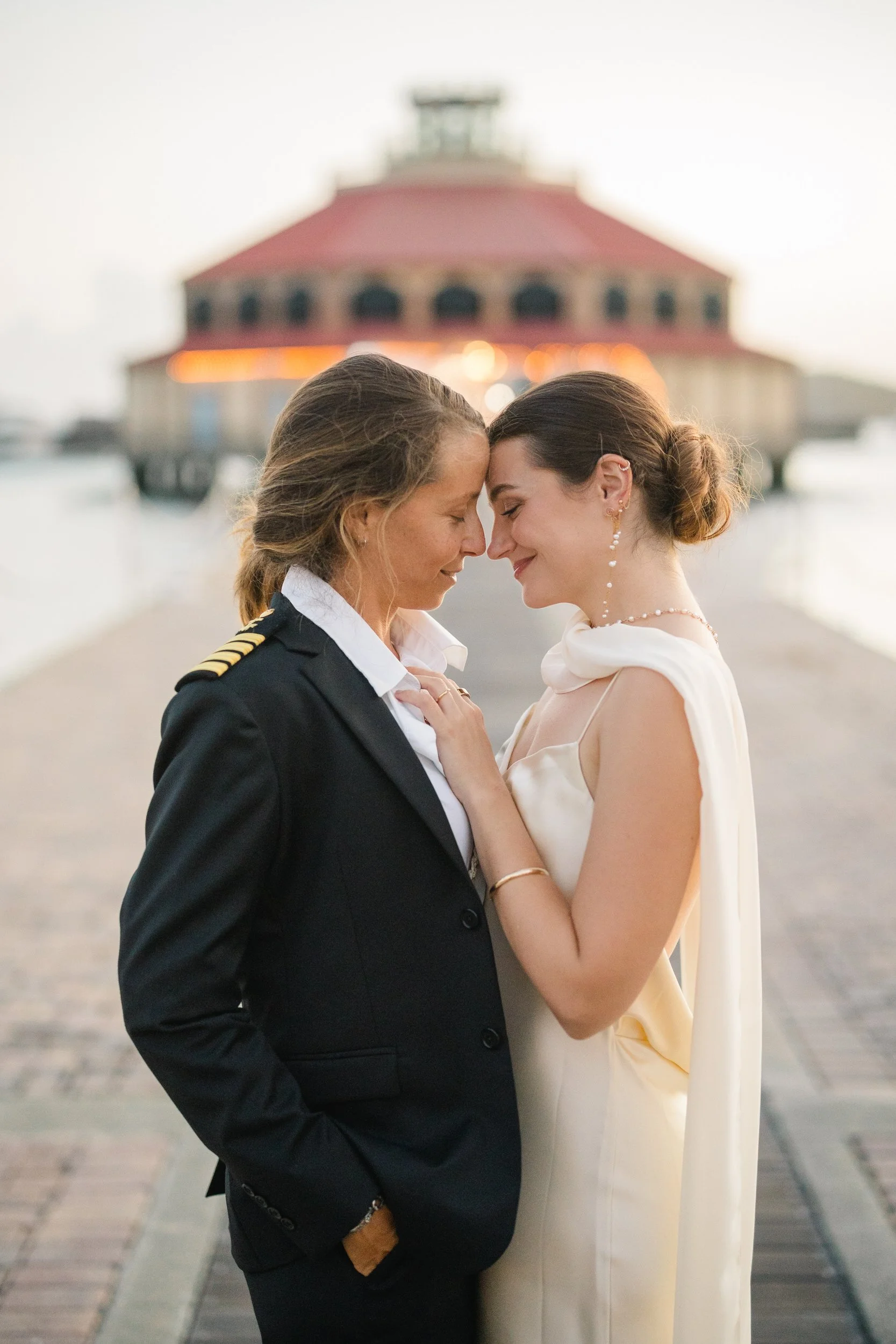 Queer destination wedding rehearsal dinner overlooking the waterfront in St. Thomas.