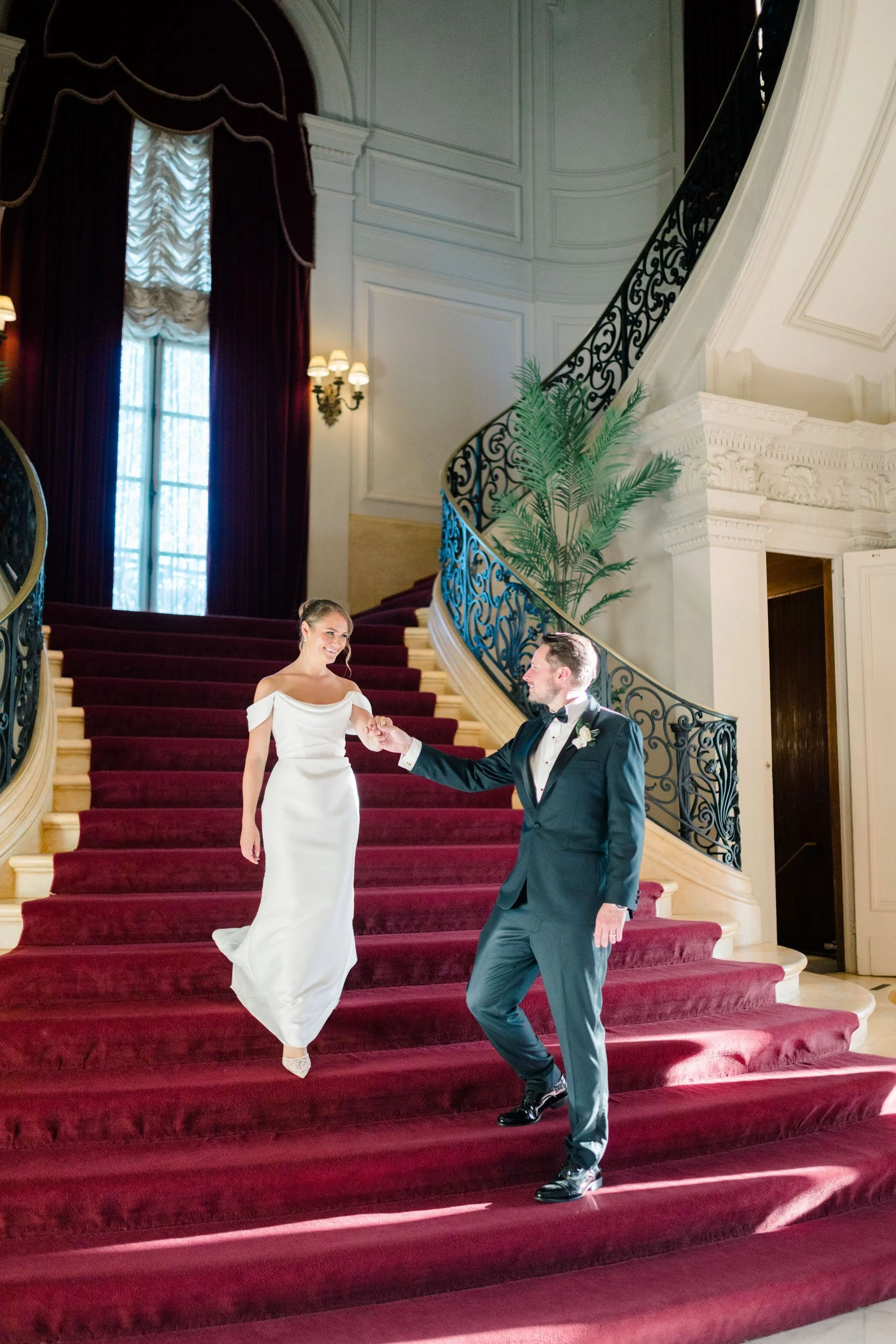 Romantic wedding portrait on Rosecliff’s grand staircase in Newport
