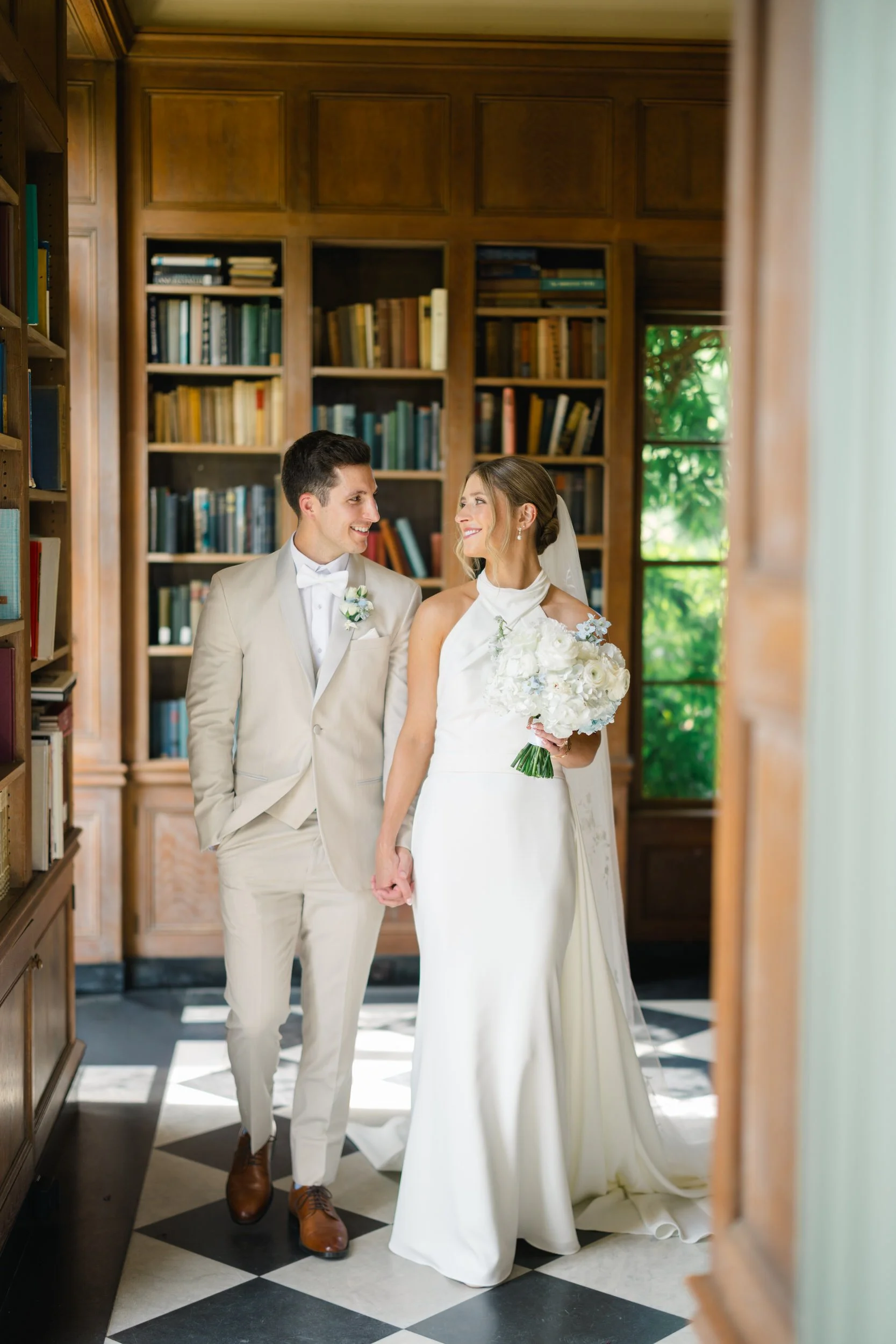Elegant couple portraits at a coastal garden party wedding.