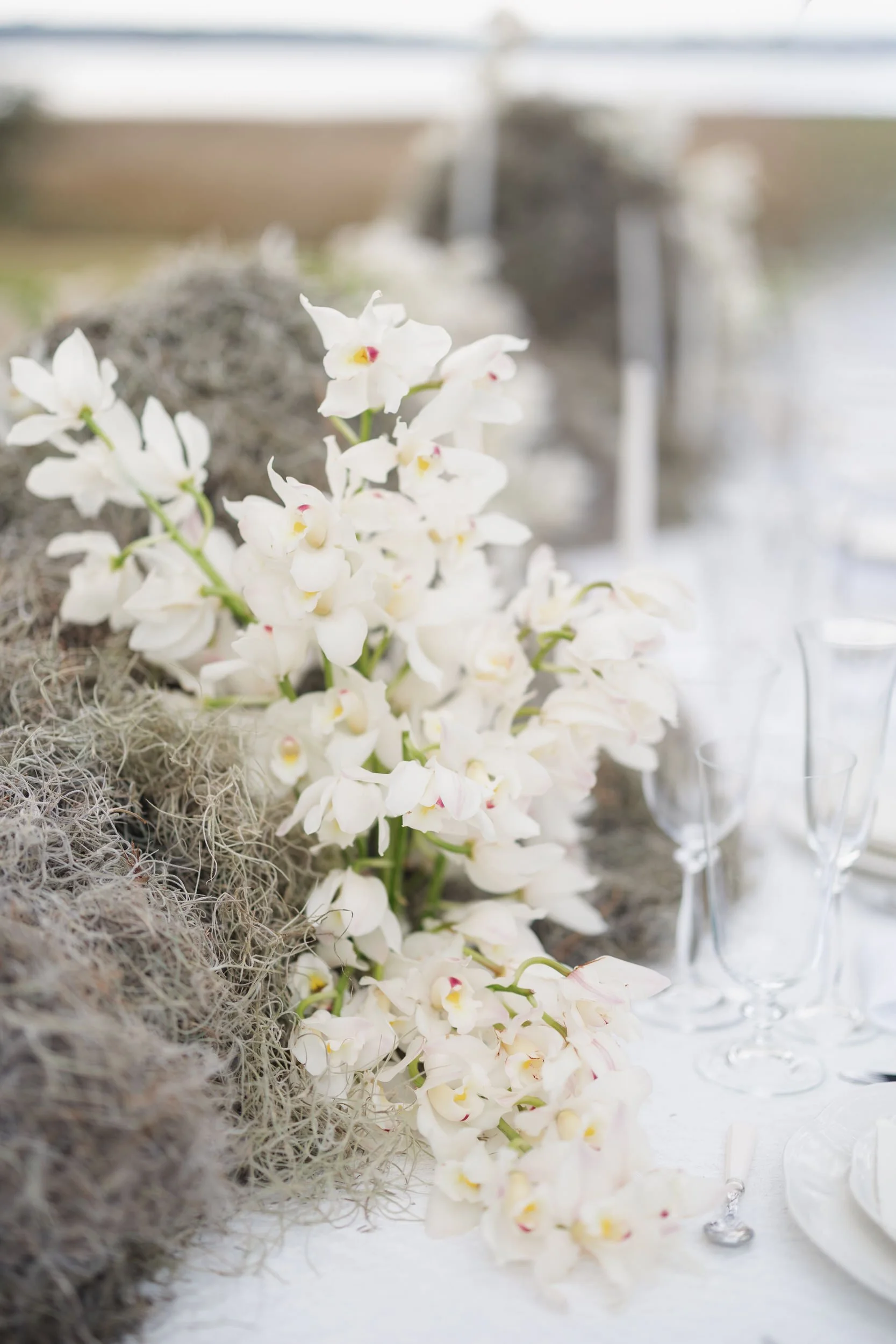 Romantic long reception tables styled under the Charleston sky at Lowndes Grove