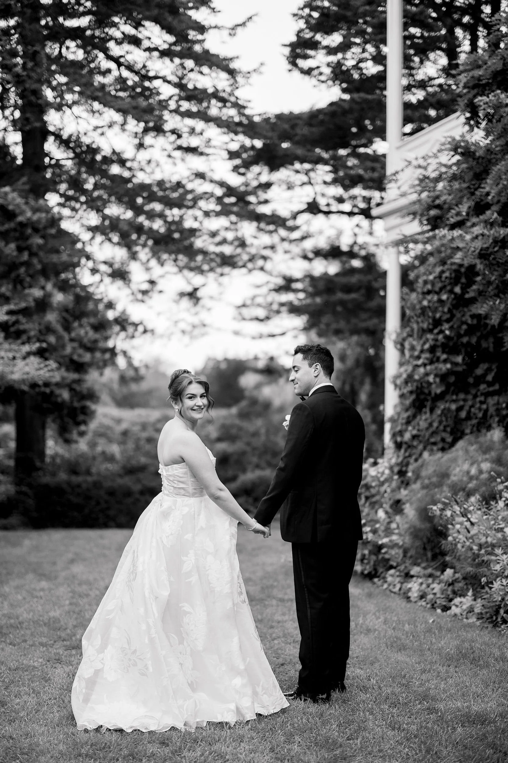 Newlyweds sharing a romantic sunset portrait at Long Hill in Beverly, Massachusetts.
