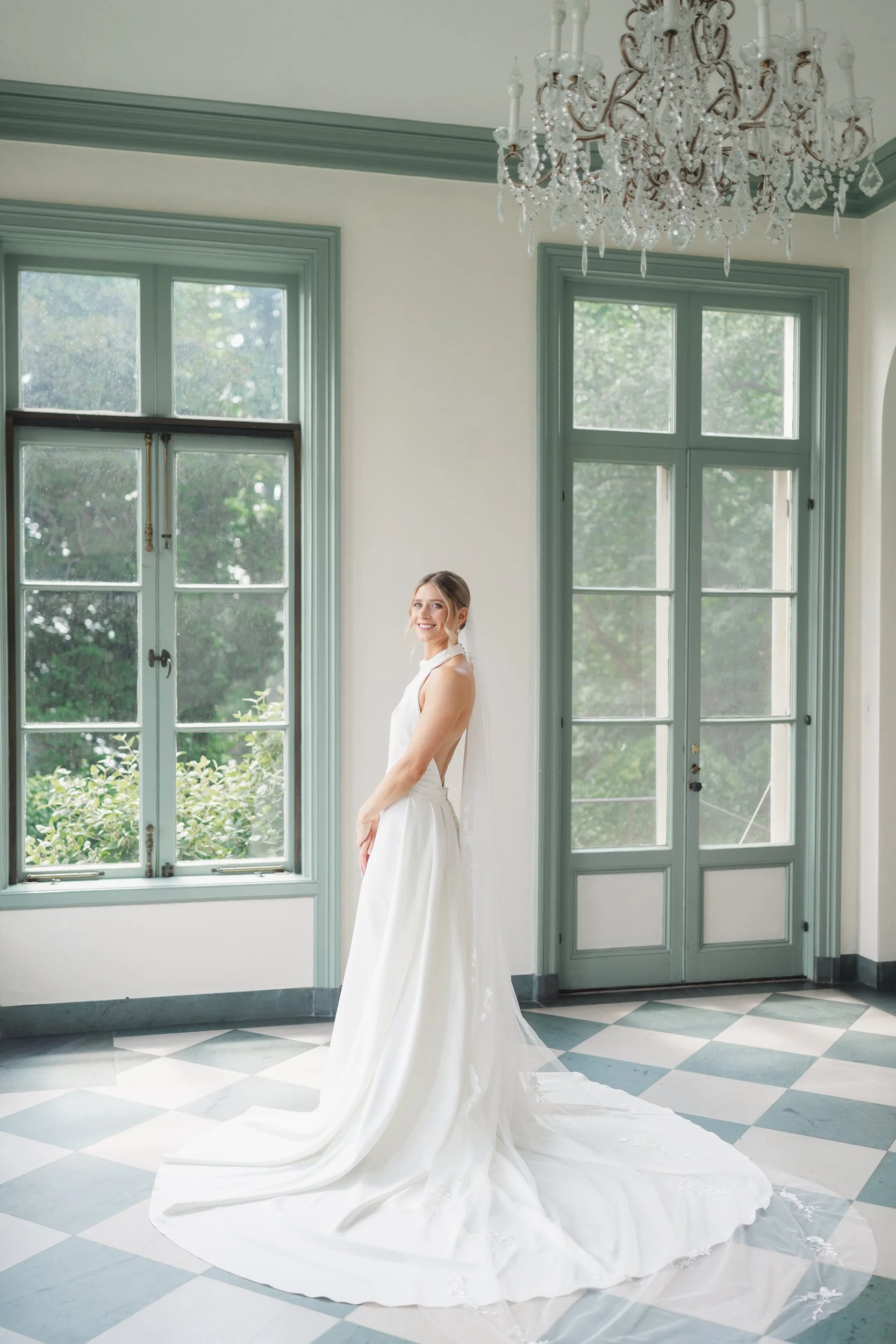 Elegant bridal portraits of the bride at Misselwood Estate on a sunny summer wedding day in Beverly, Massachusetts.