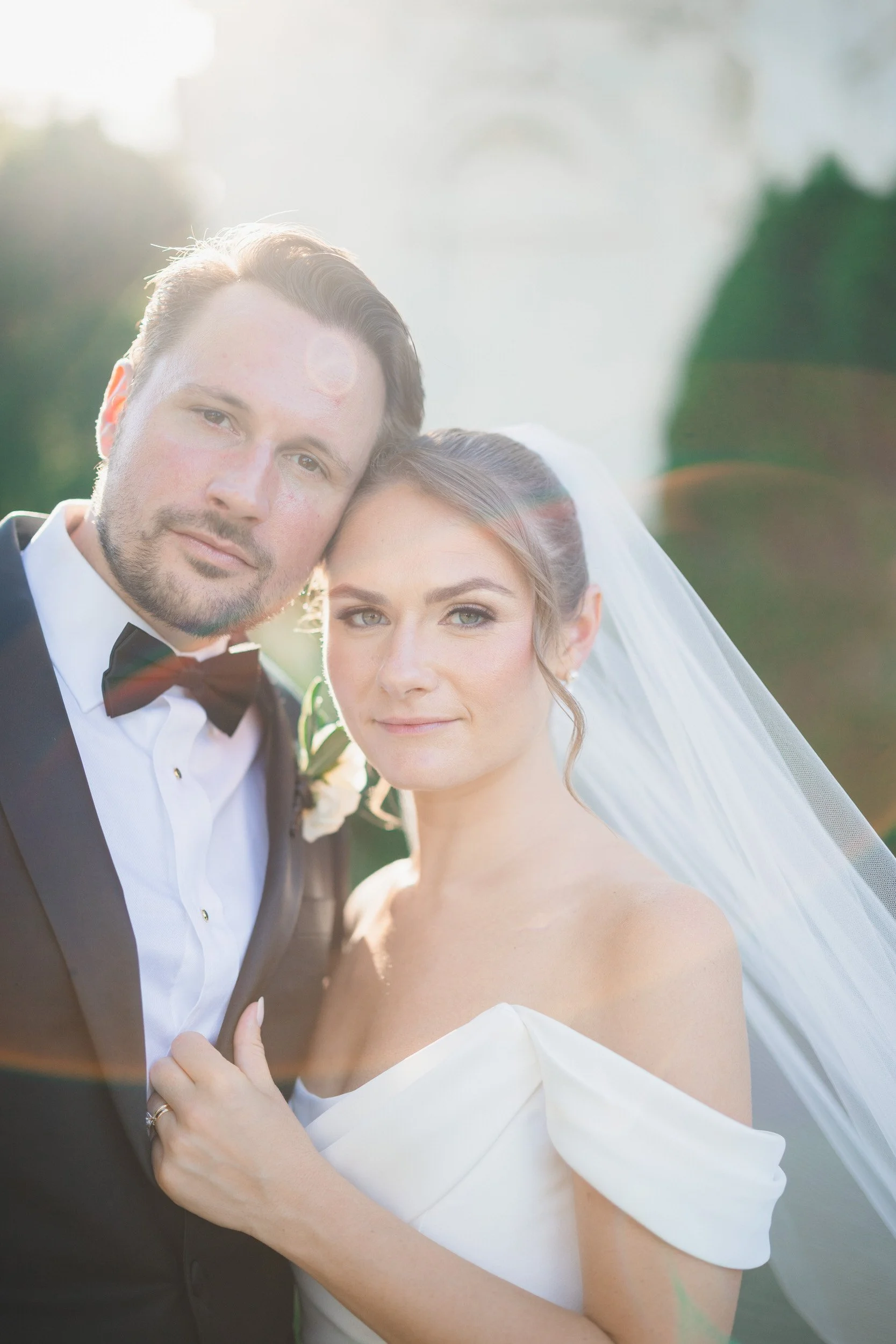 Romantic newlywed portraits at Rosecliff Mansion
