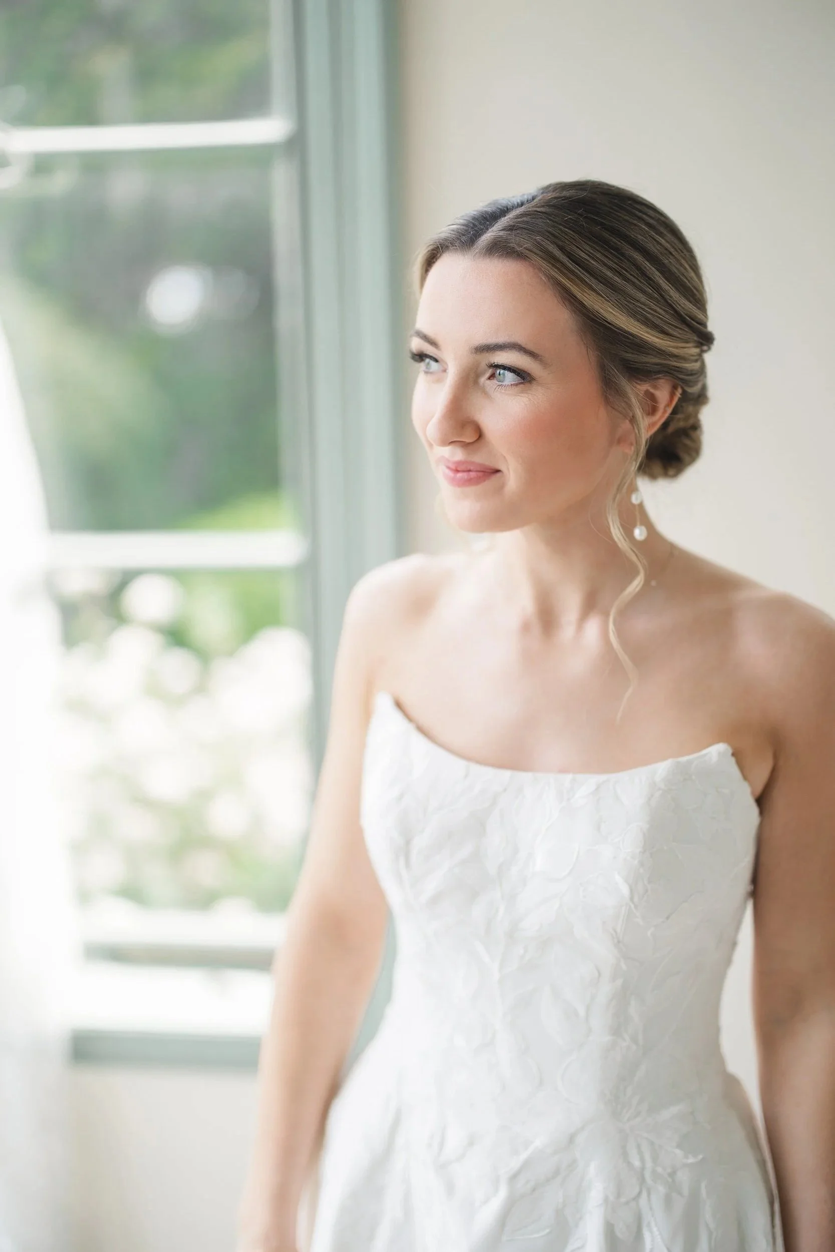 Editorial bridal portraits in colorful historic room overlooking the ocean