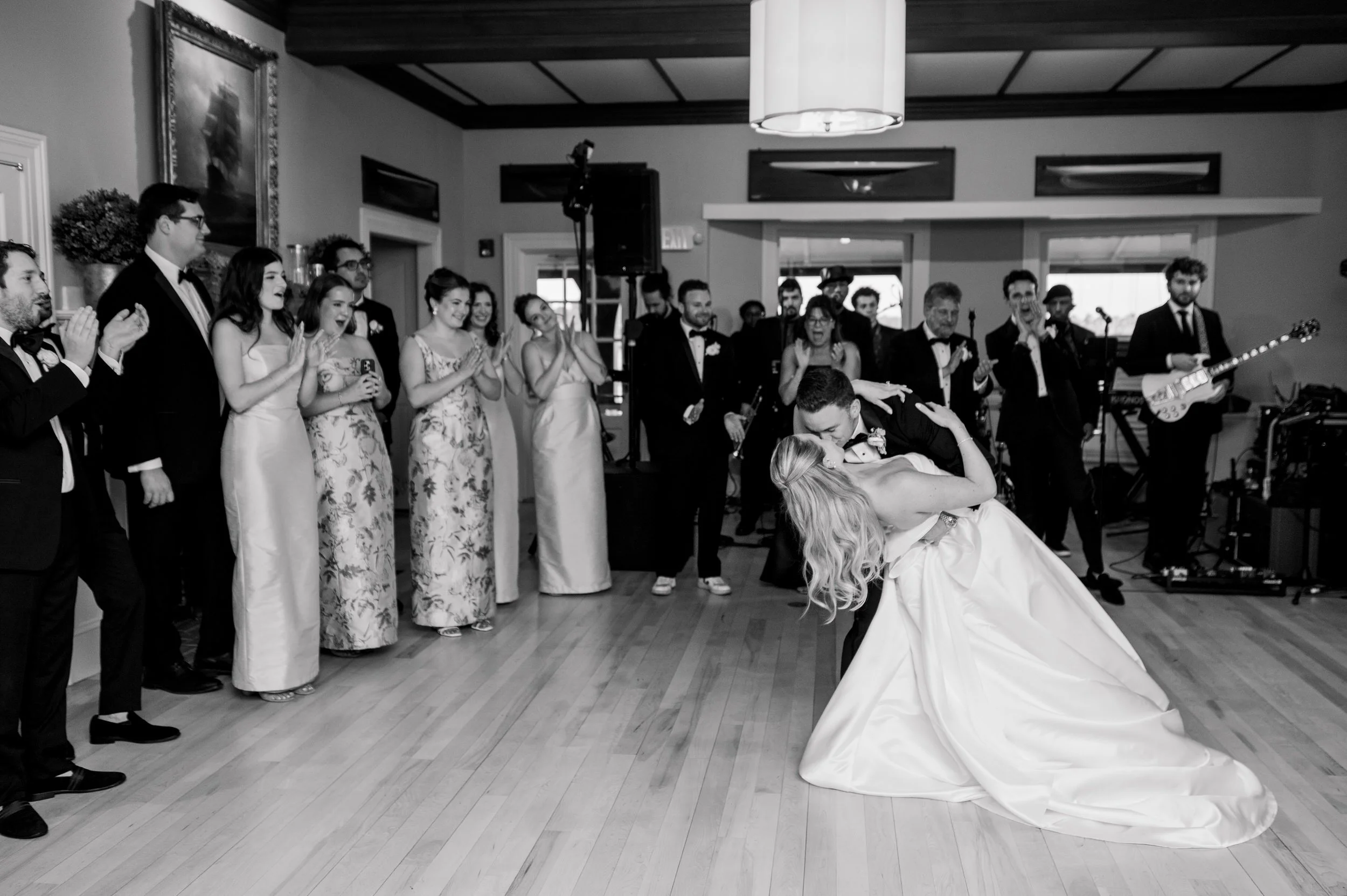 Wedding reception at Corinthian Yacht Club overlooking Marblehead Harbor with dancing and celebration.