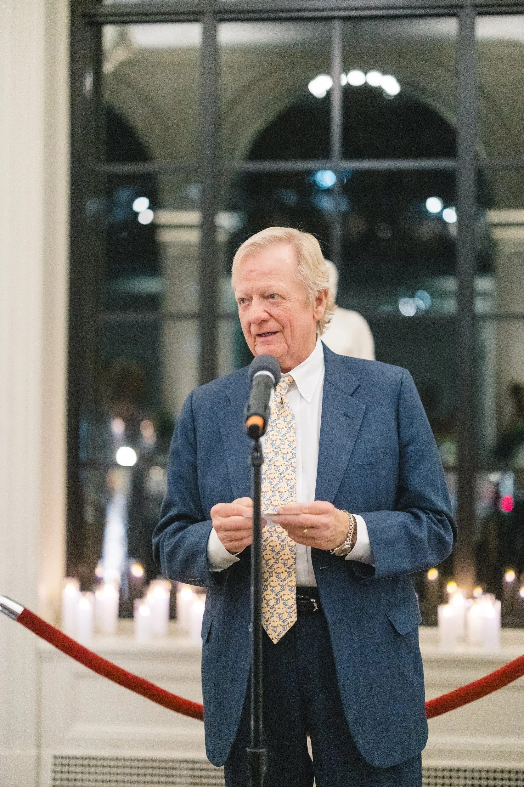 Emotional speech during a candlelit rehearsal dinner at the Boston Athenaeum