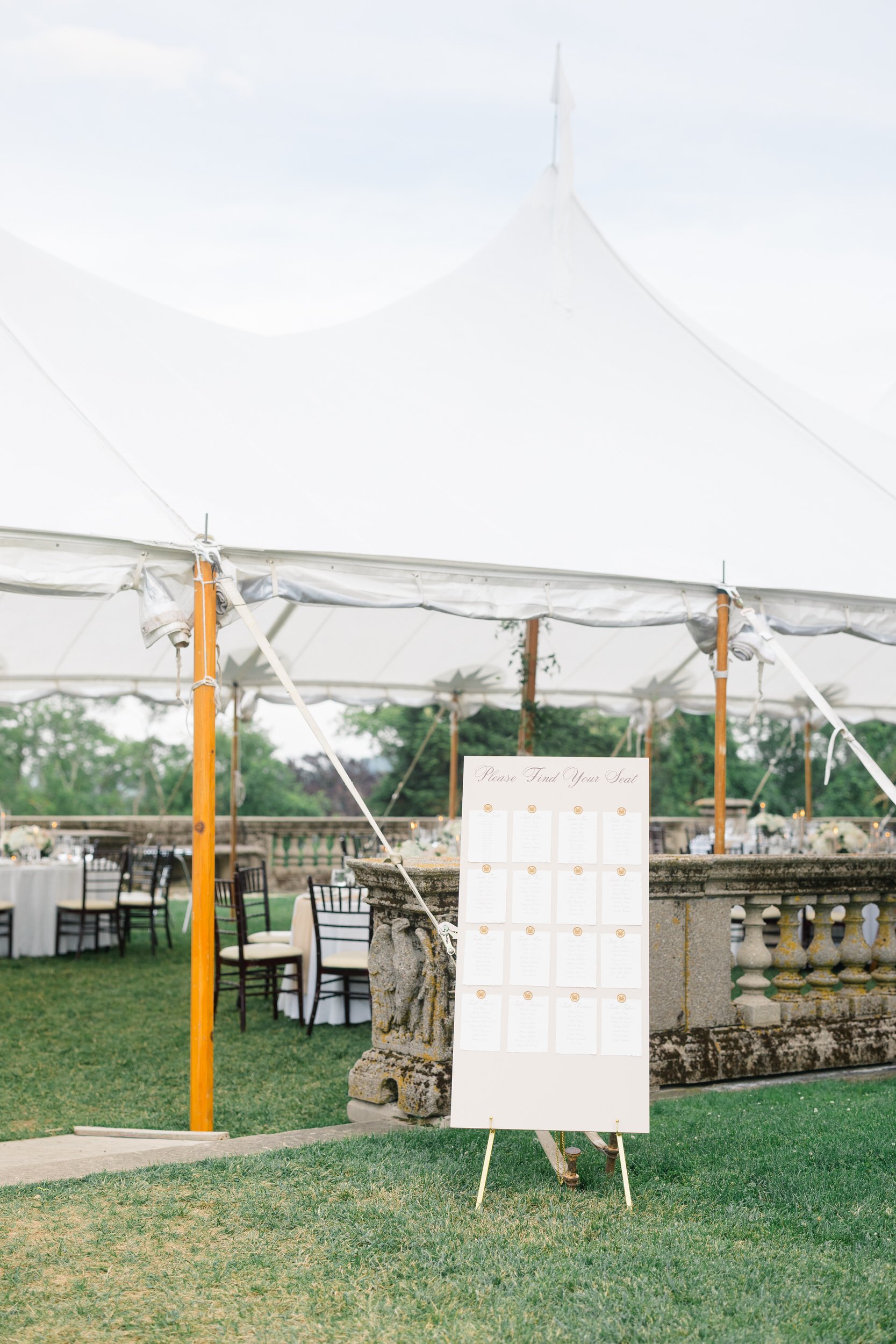 Elegant seating chart for a Castle Hill on the Crane Estate reception.