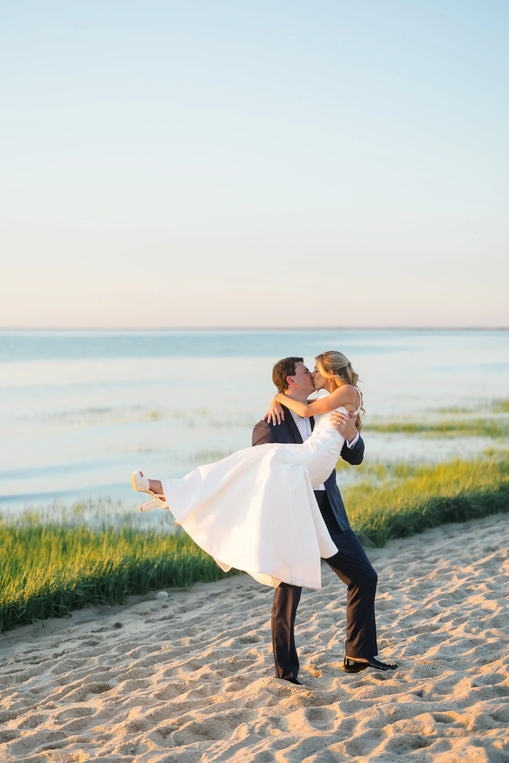 Golden hour beach portraits at Ocean Edge Resort wedding