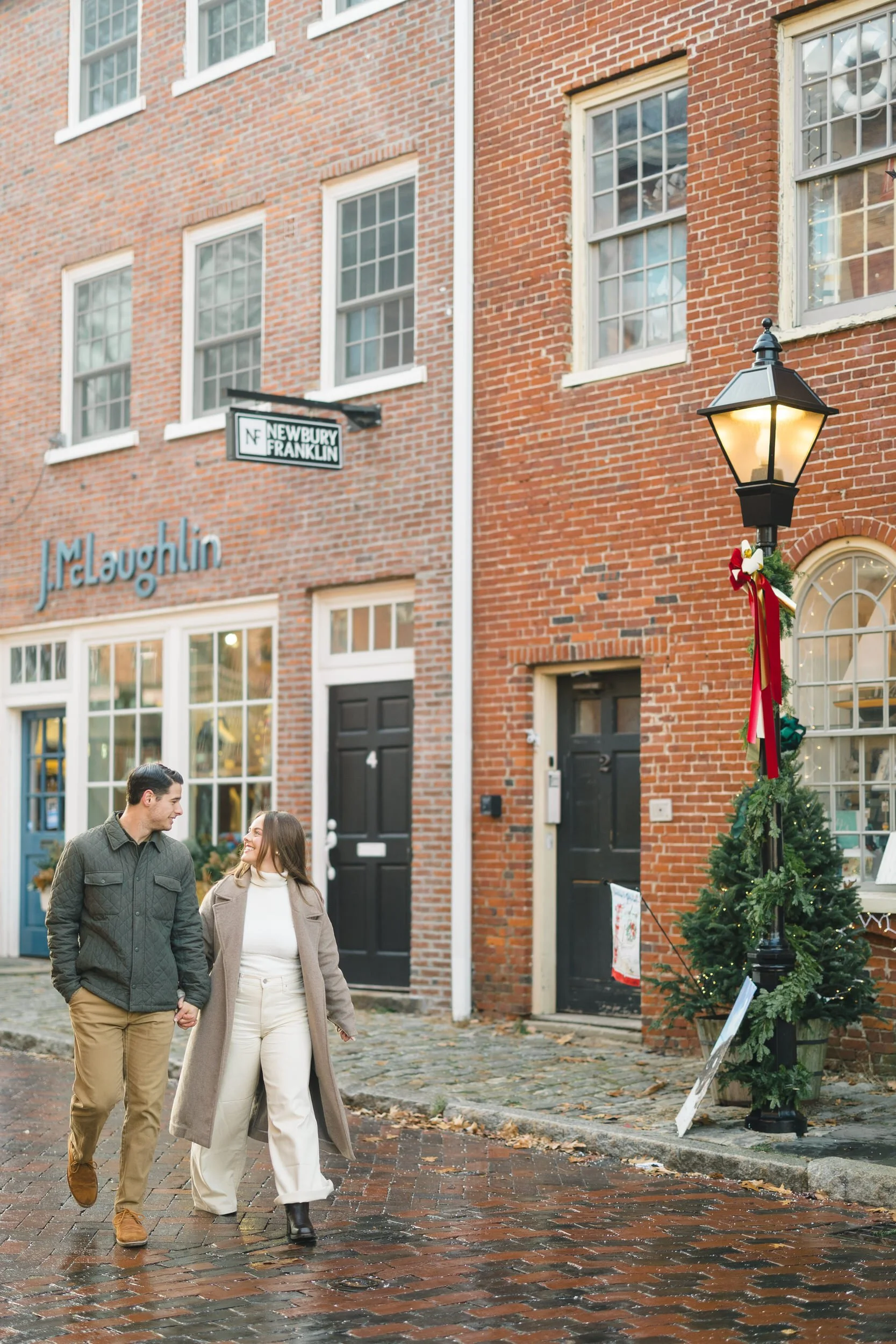 Candid moments from a Newburyport engagement session captured in winter light.