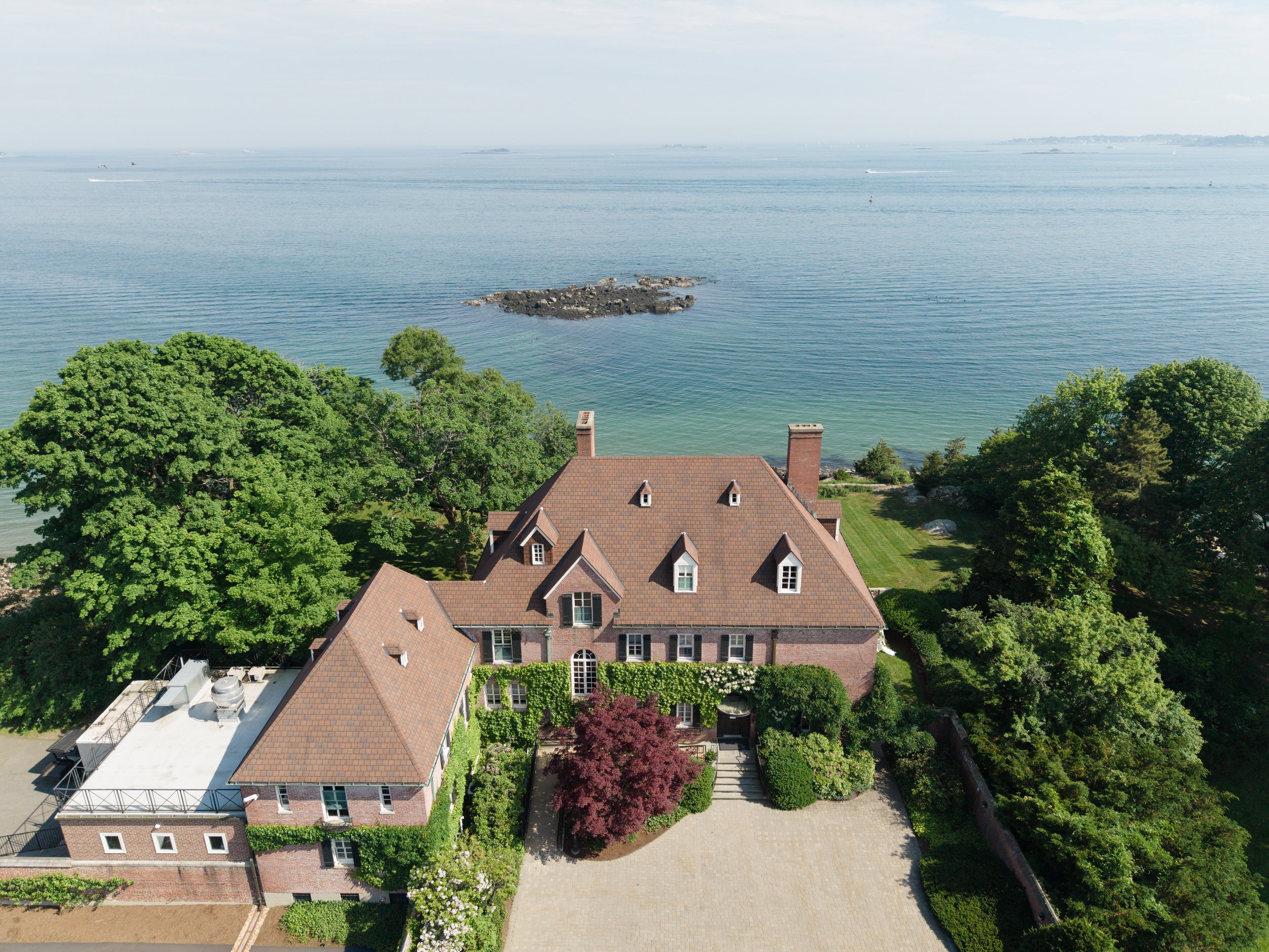 Misselwood Estate overlooking the Atlantic Ocean on a perfect summer wedding day in Beverly, Massachusetts.