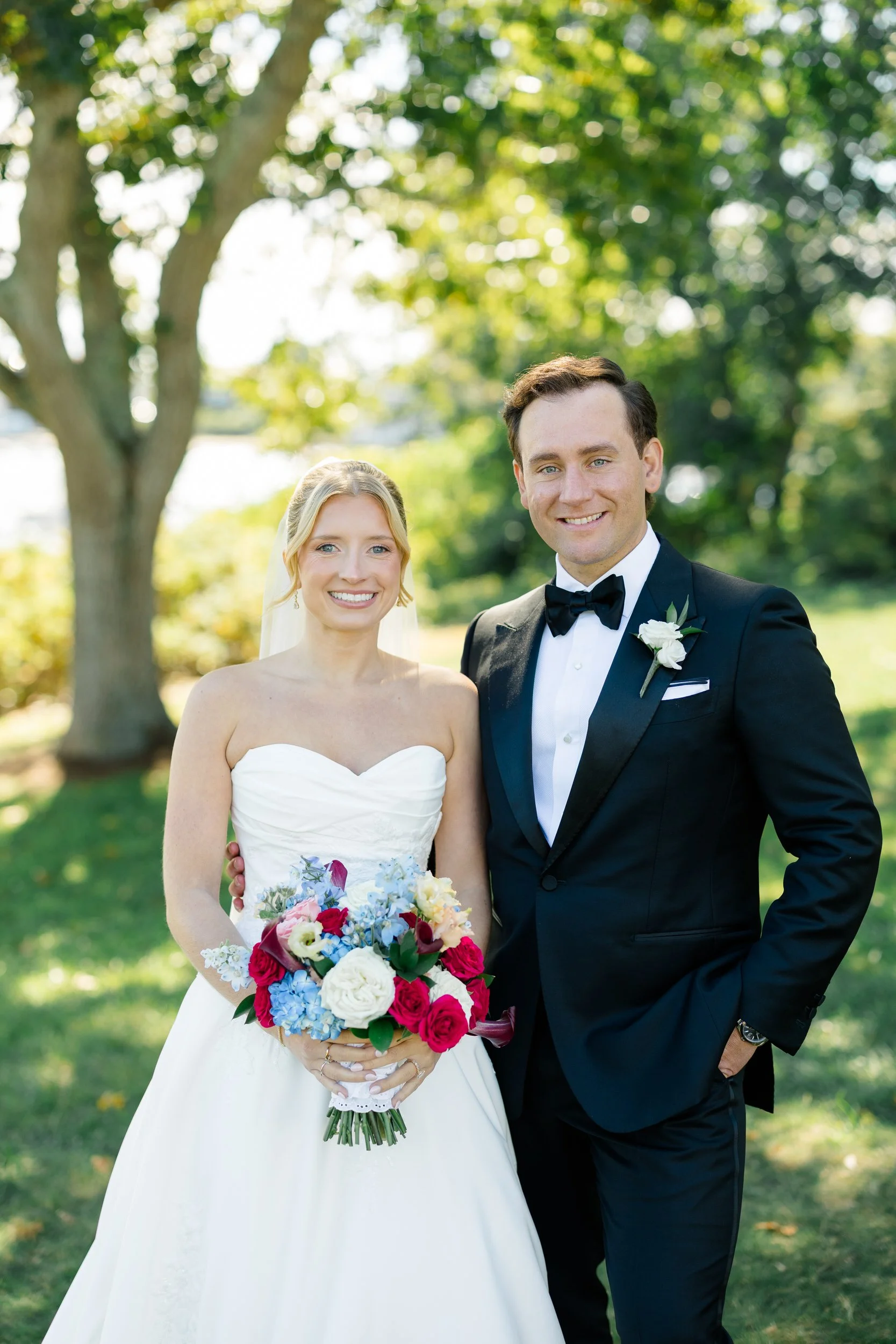Coastal wedding portraits with harbor views at Wychmere Beach Club.