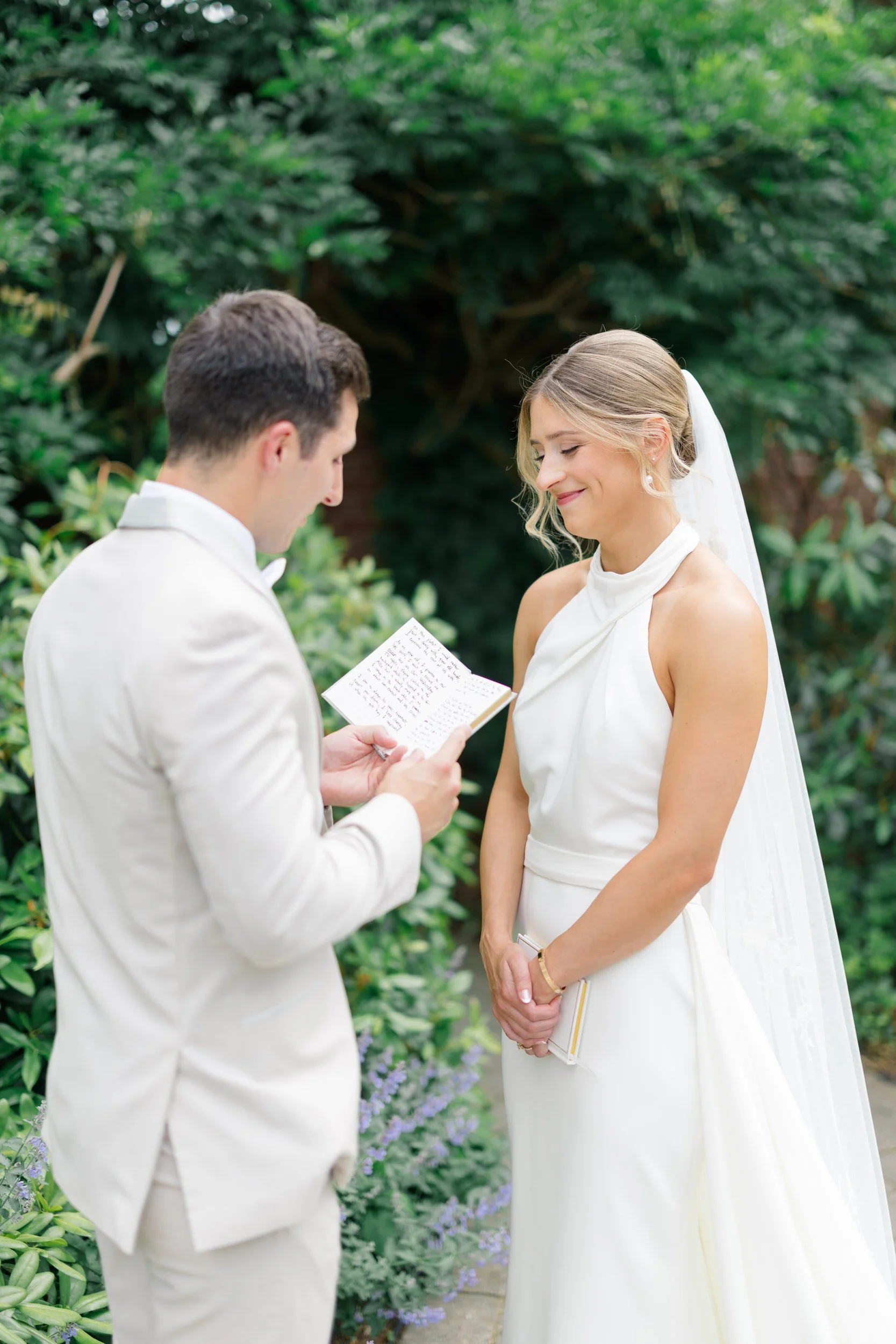 Emotional moment as the couple shares personal vows together.