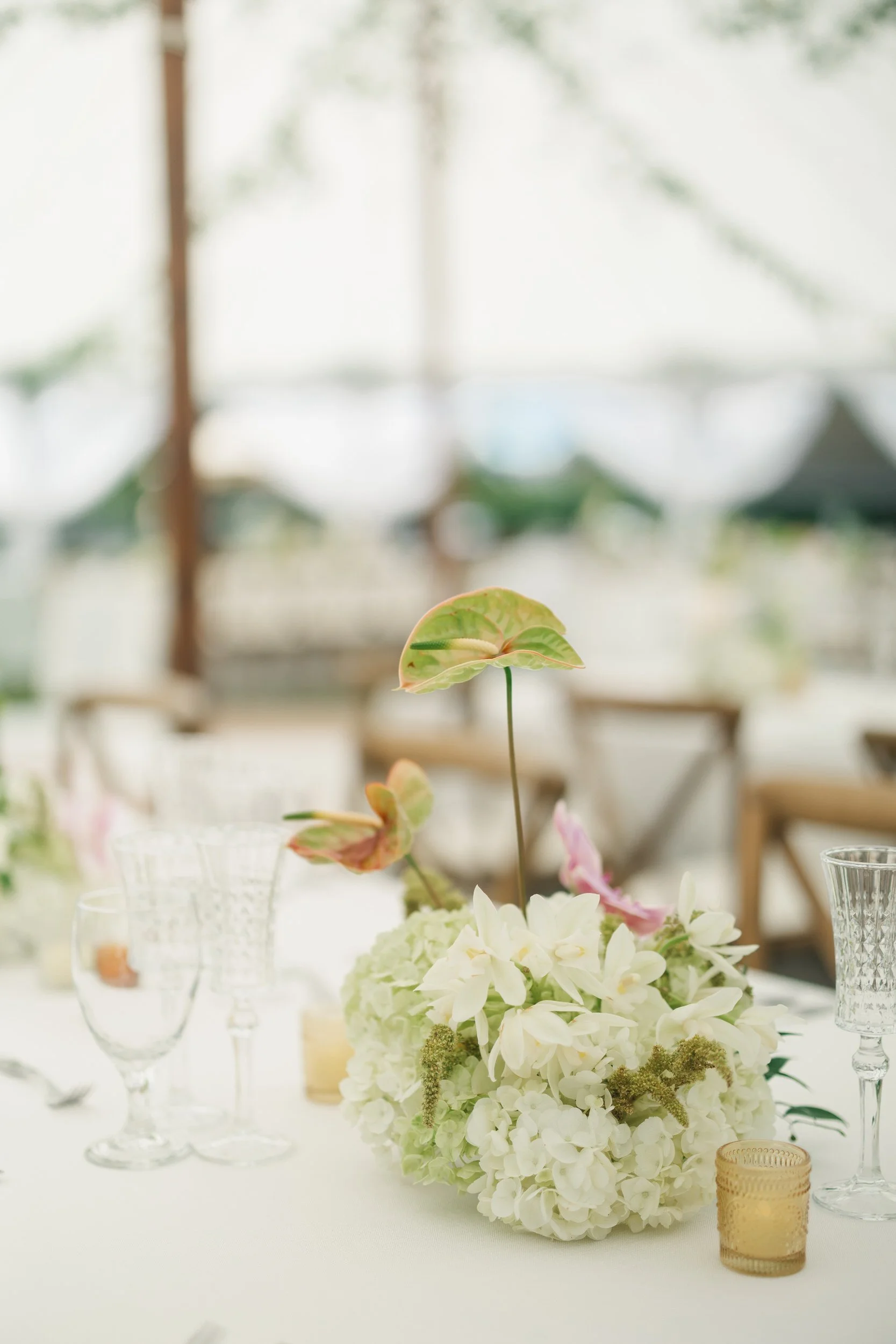 place settings and florals at sunset ranch oahu reception