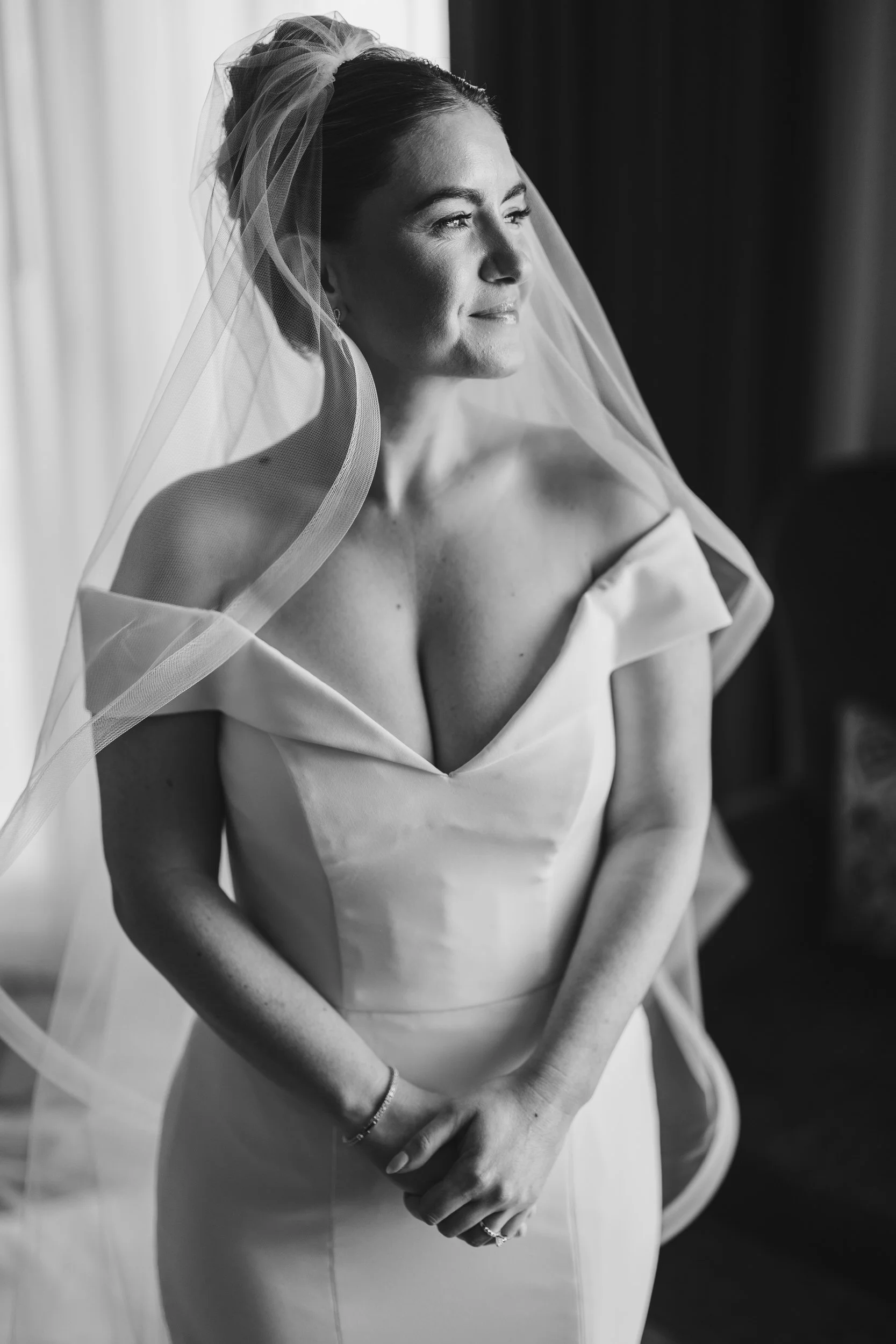 Bridal portraits captured during getting ready at the Boston Harbor Hotel in Boston