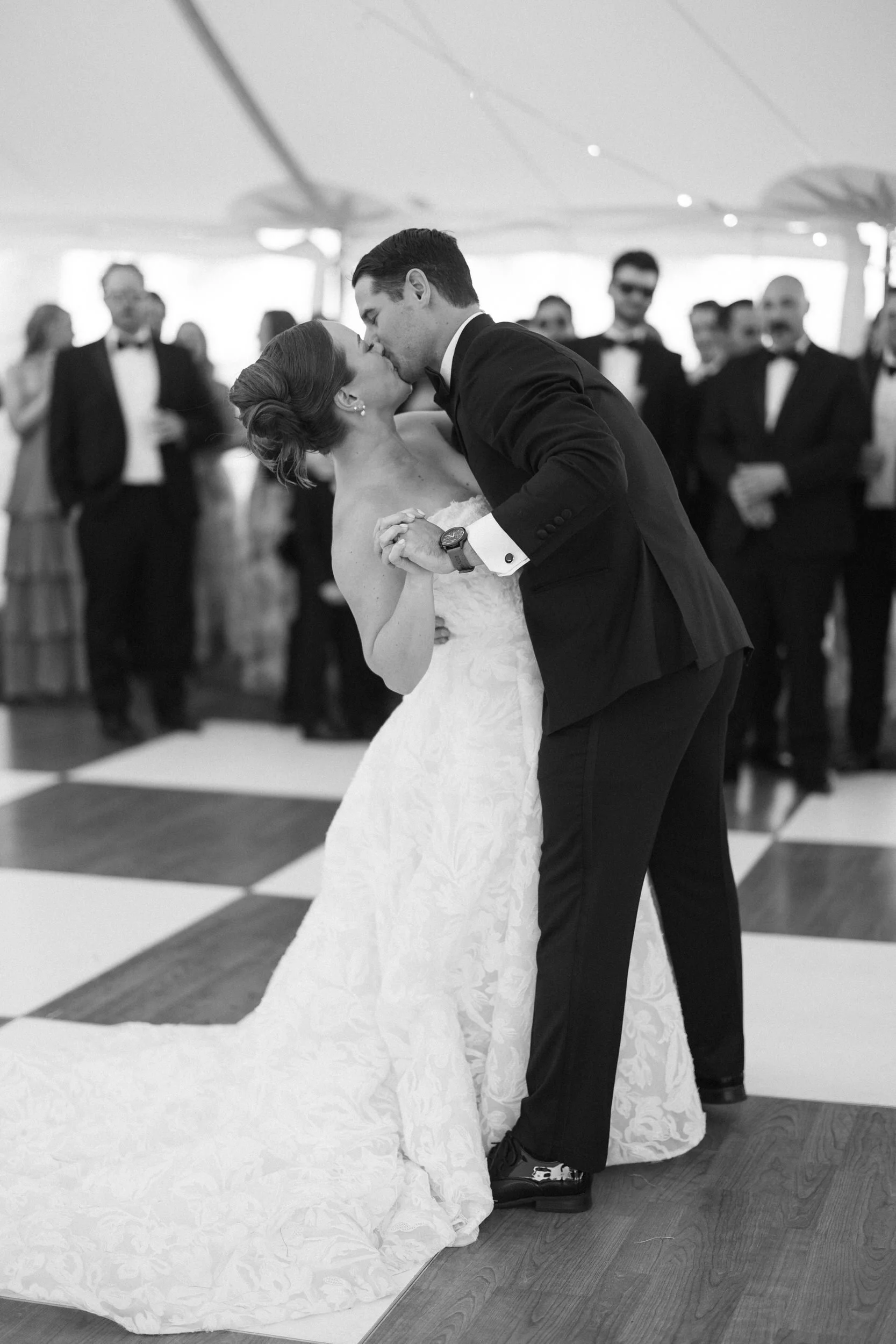 Bride and groom celebrating on the dance floor.