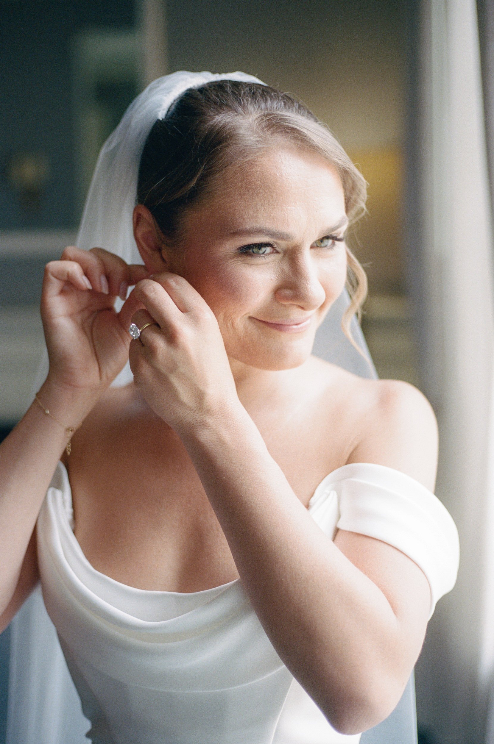Elegant bridal portraits at Hotel Viking before a Rosecliff wedding