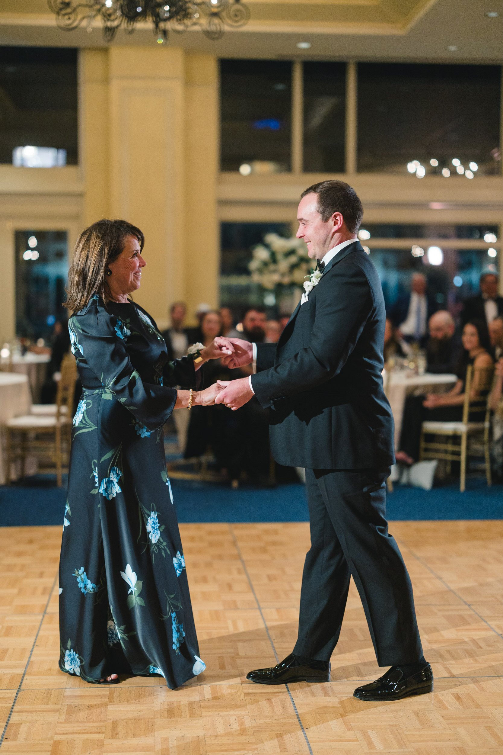 Parent dances during a Boston Harbor Hotel wedding