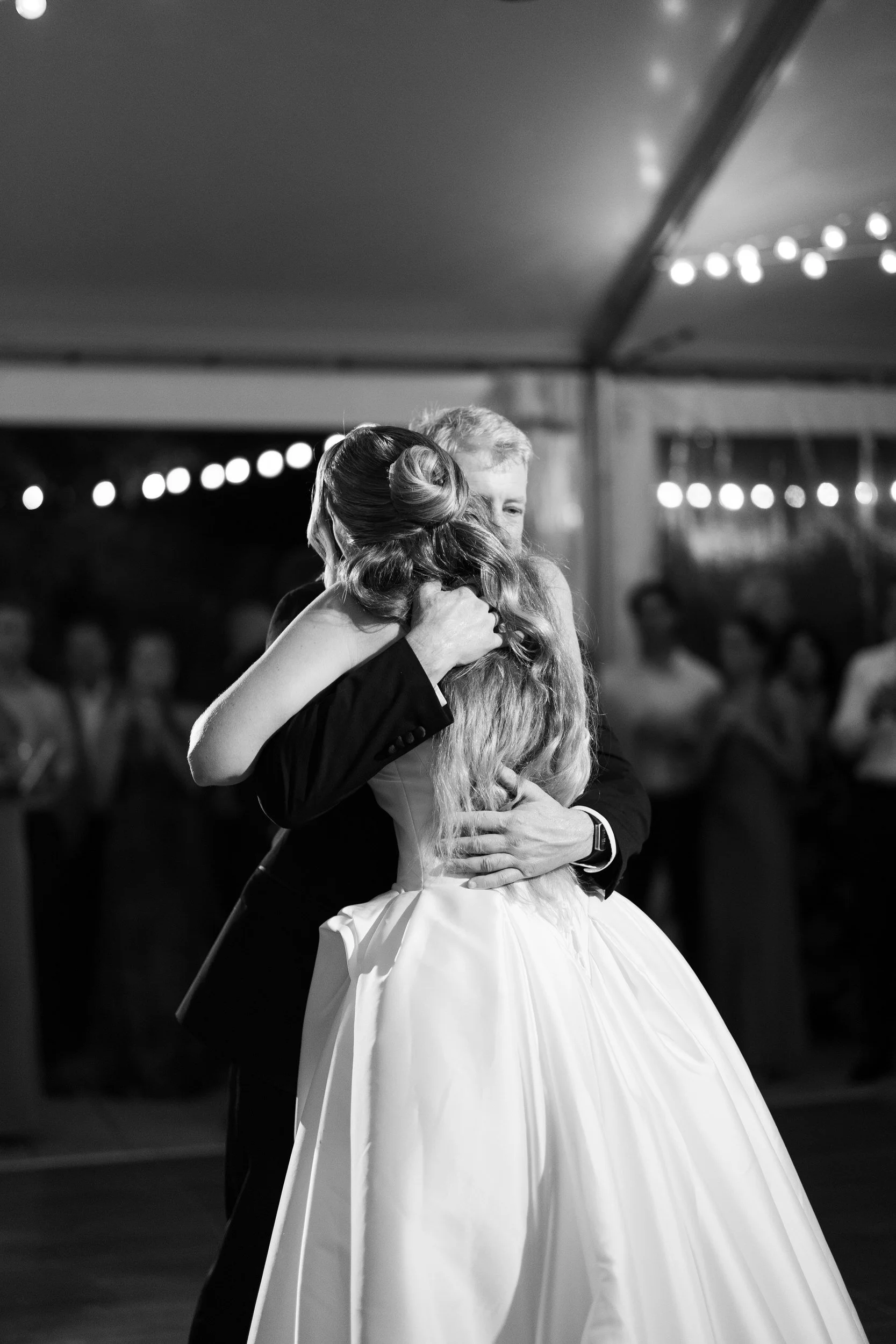 Friends and family dancing during an Italian garden wedding celebration