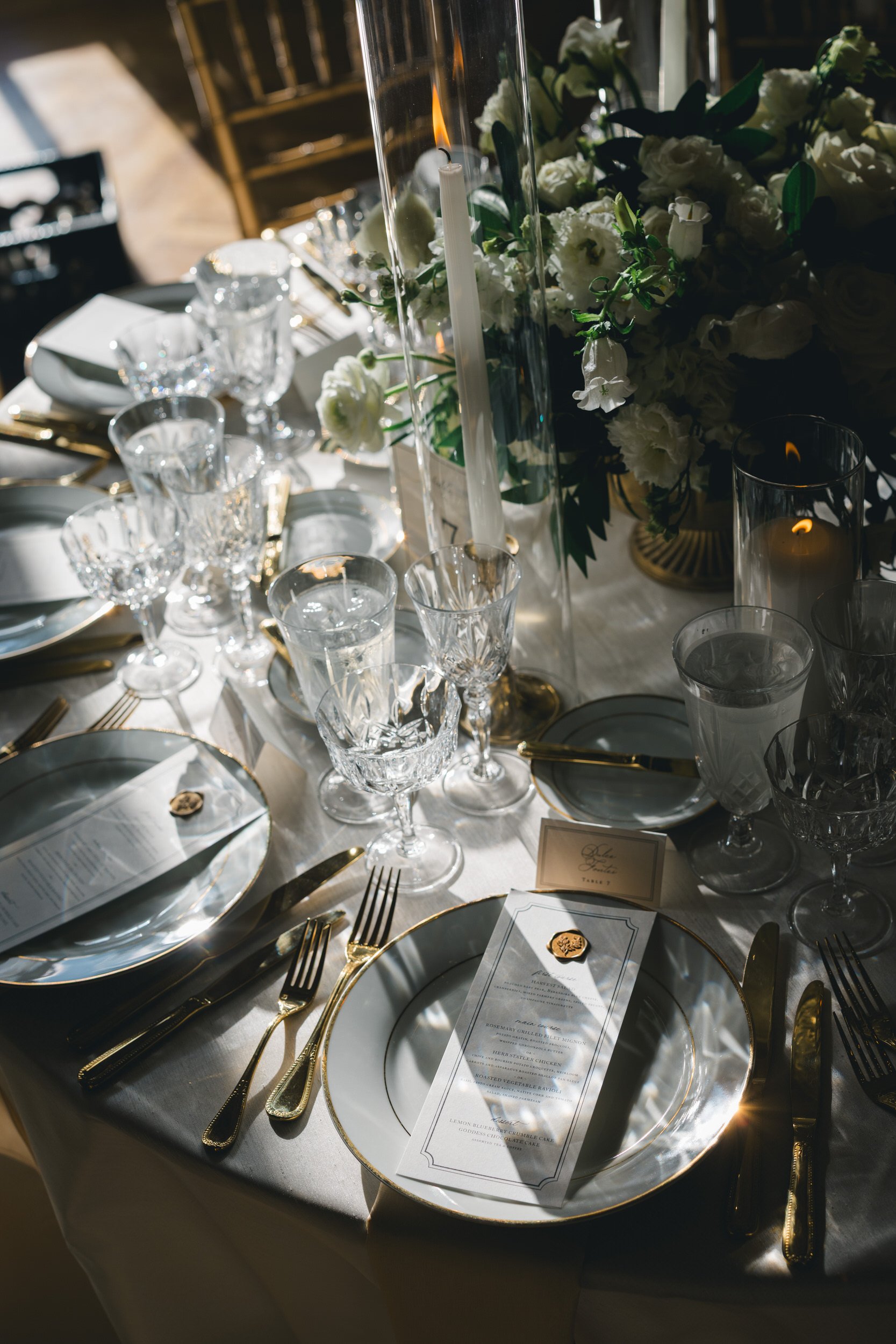 Rosecliff wedding reception decor with candles and florals