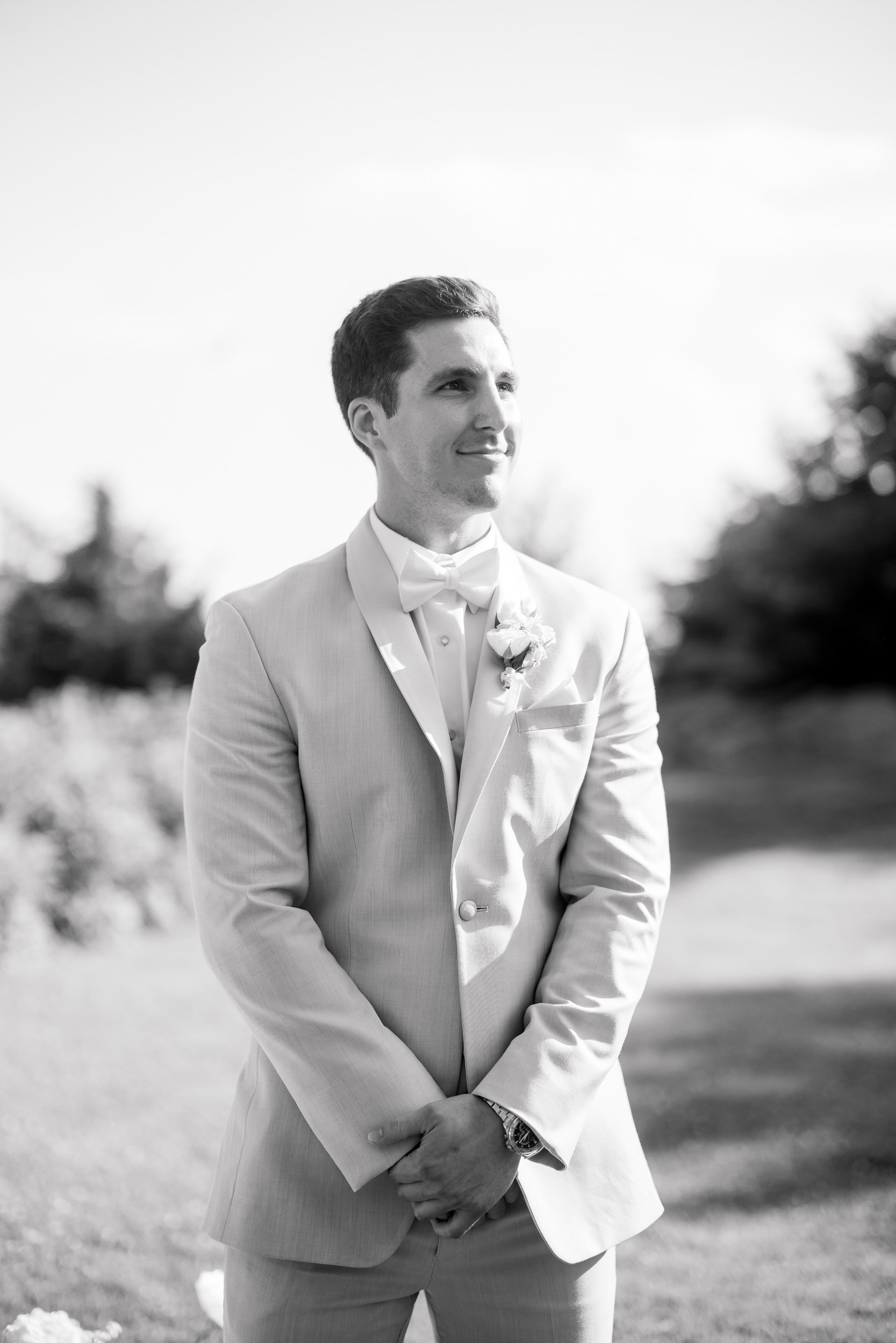 Bride and groom exchanging vows during an outdoor wedding ceremony at Misselwood Estate.